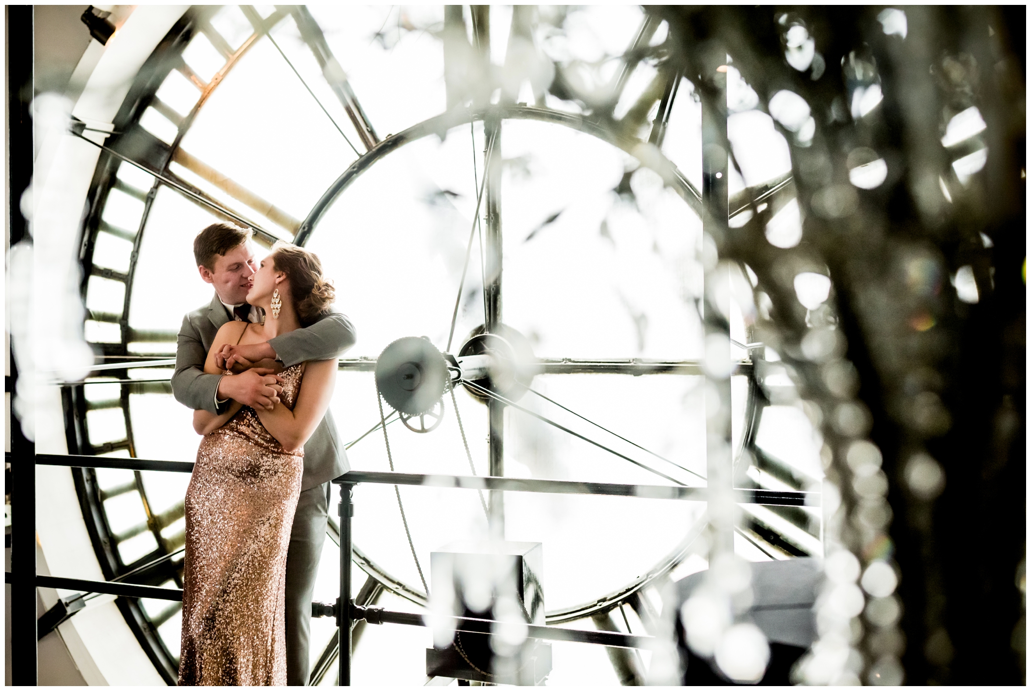 groom hugging bride in sparkly gold dress at Clock Tower Events wedding elopement 