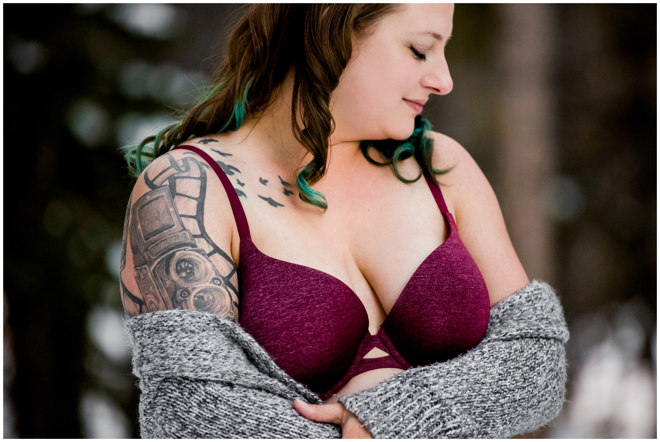 Colorado outdoor boudoir of a tattooed woman in the snow 