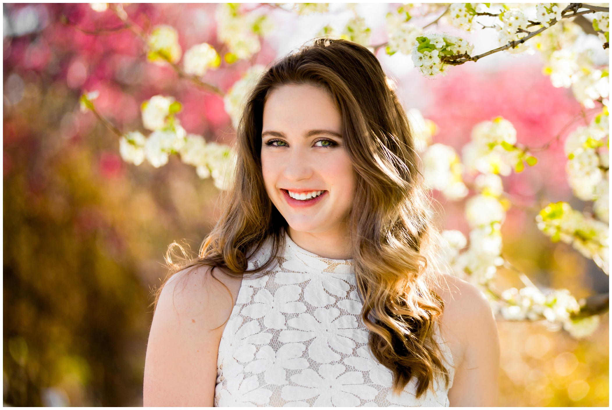 Longmont senior photos with the cherry blossom trees in the background