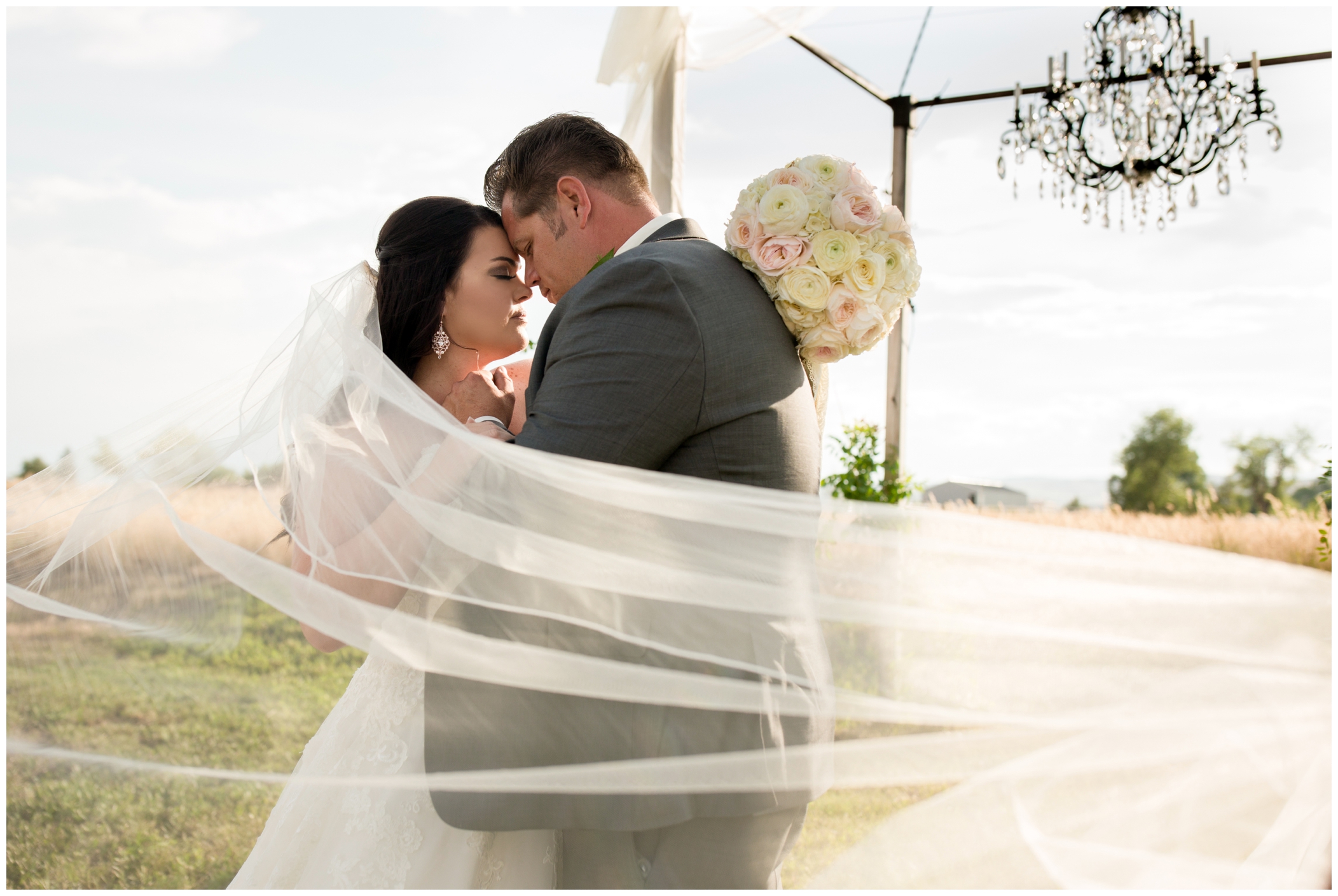 dramatic veil photos at Stonewall Farm Colorado wedding