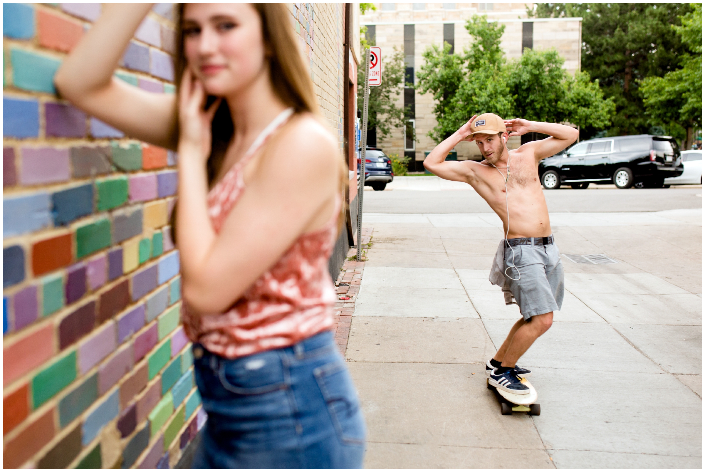 guy on skateboard photo-bombing a Boulder Colorado senior photography session 