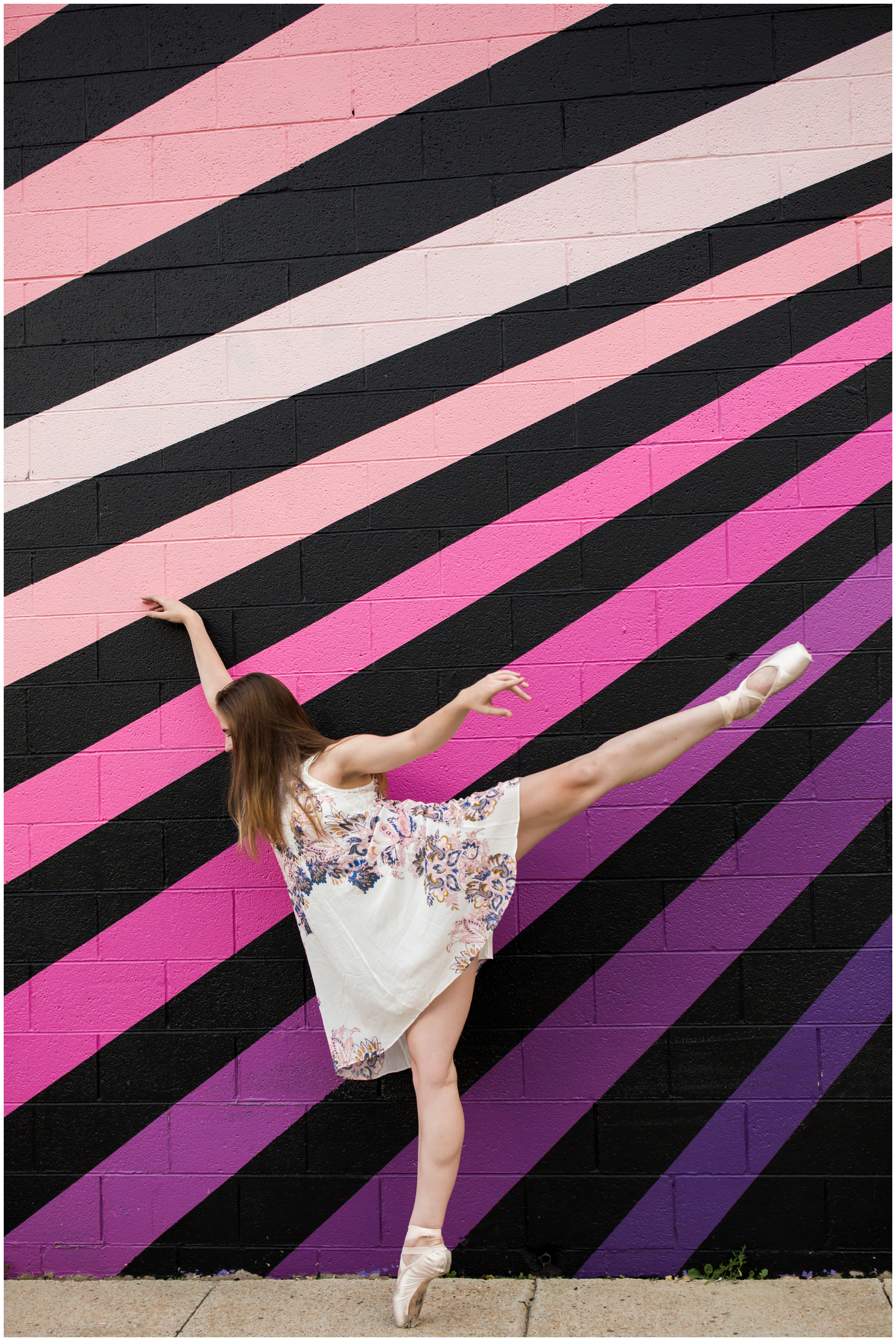 ballet dancer against a colorful wall at Boulder Colorado senior portraits 