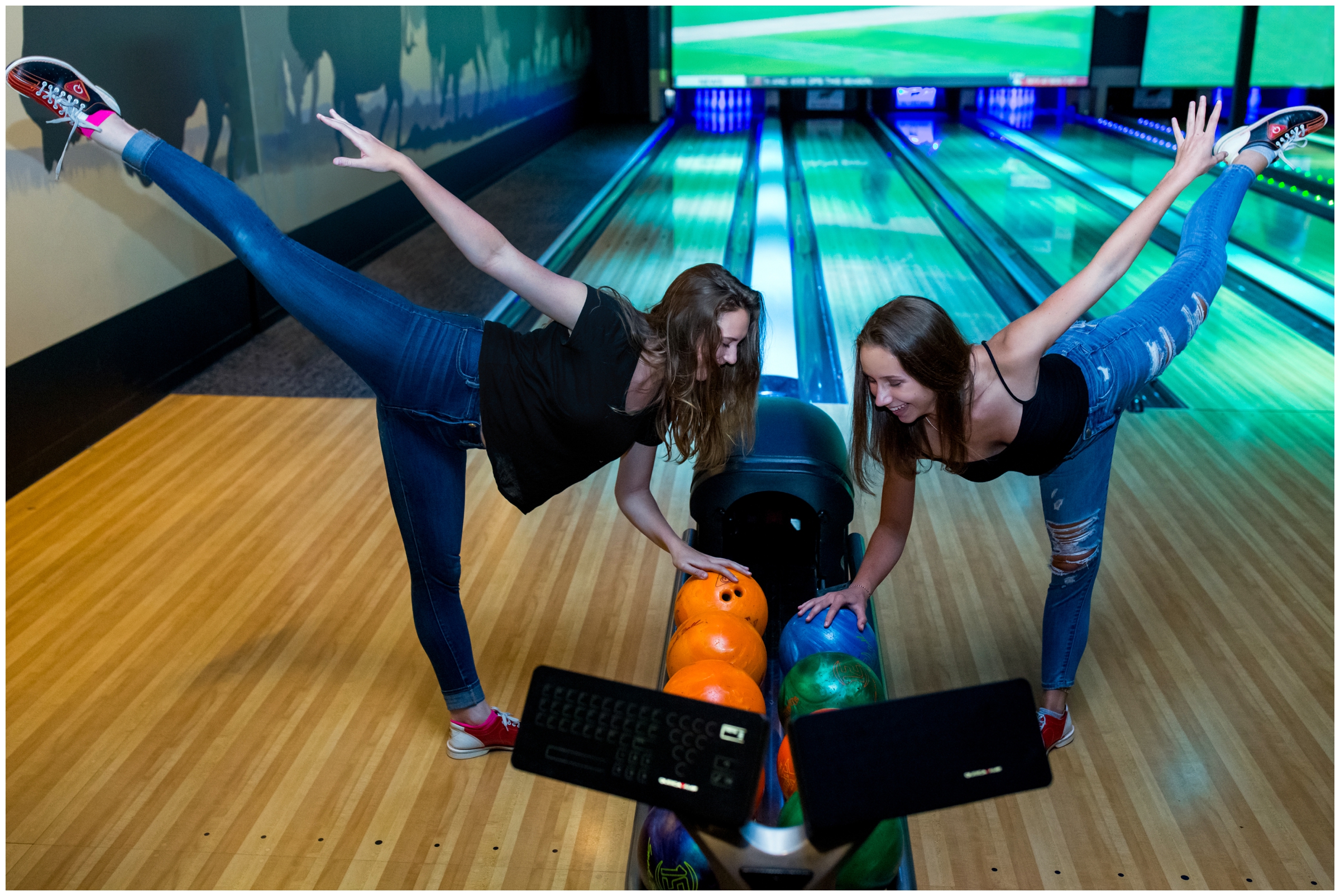 teen girls goofing around at Longmont bowling alley
