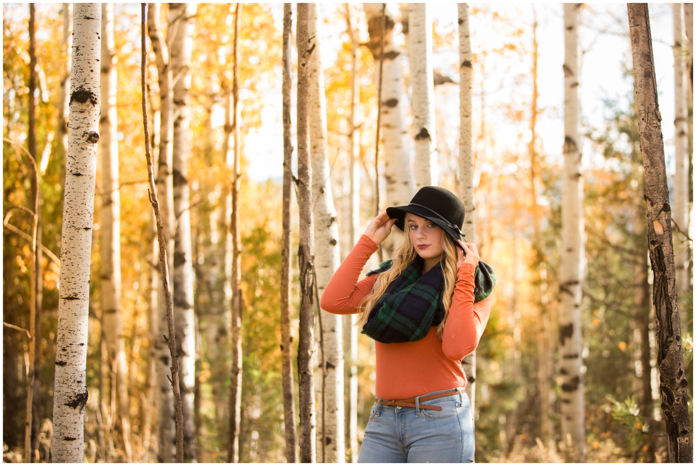 teen girl posing in aspen grove during Colorado mountain senior pictures 