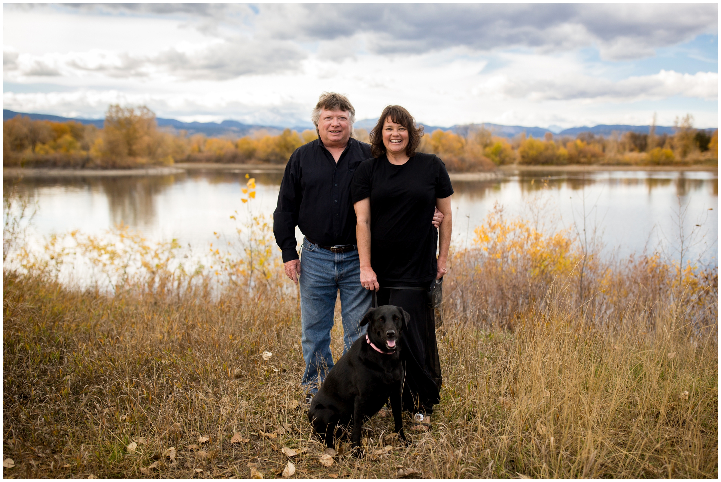 couple posing with dog at Golden Ponds family photos in Longmont Colorado