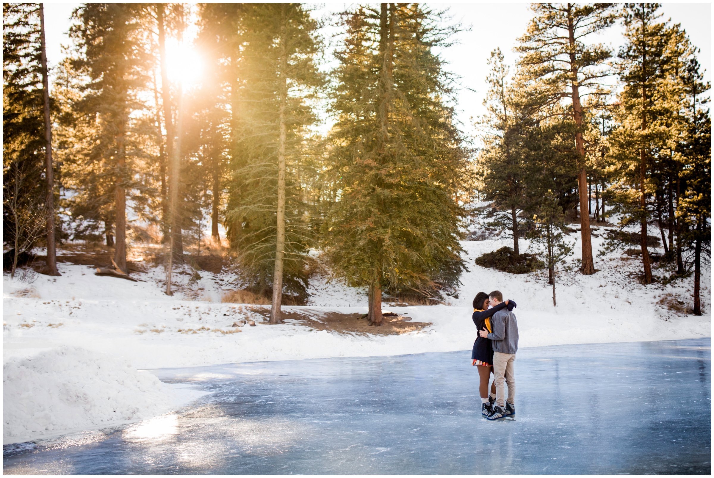 couple ice skating during Colorado winter engagement photos at YMCA of the Rockies by Estes Park wedding photographer Plum Pretty Photography
