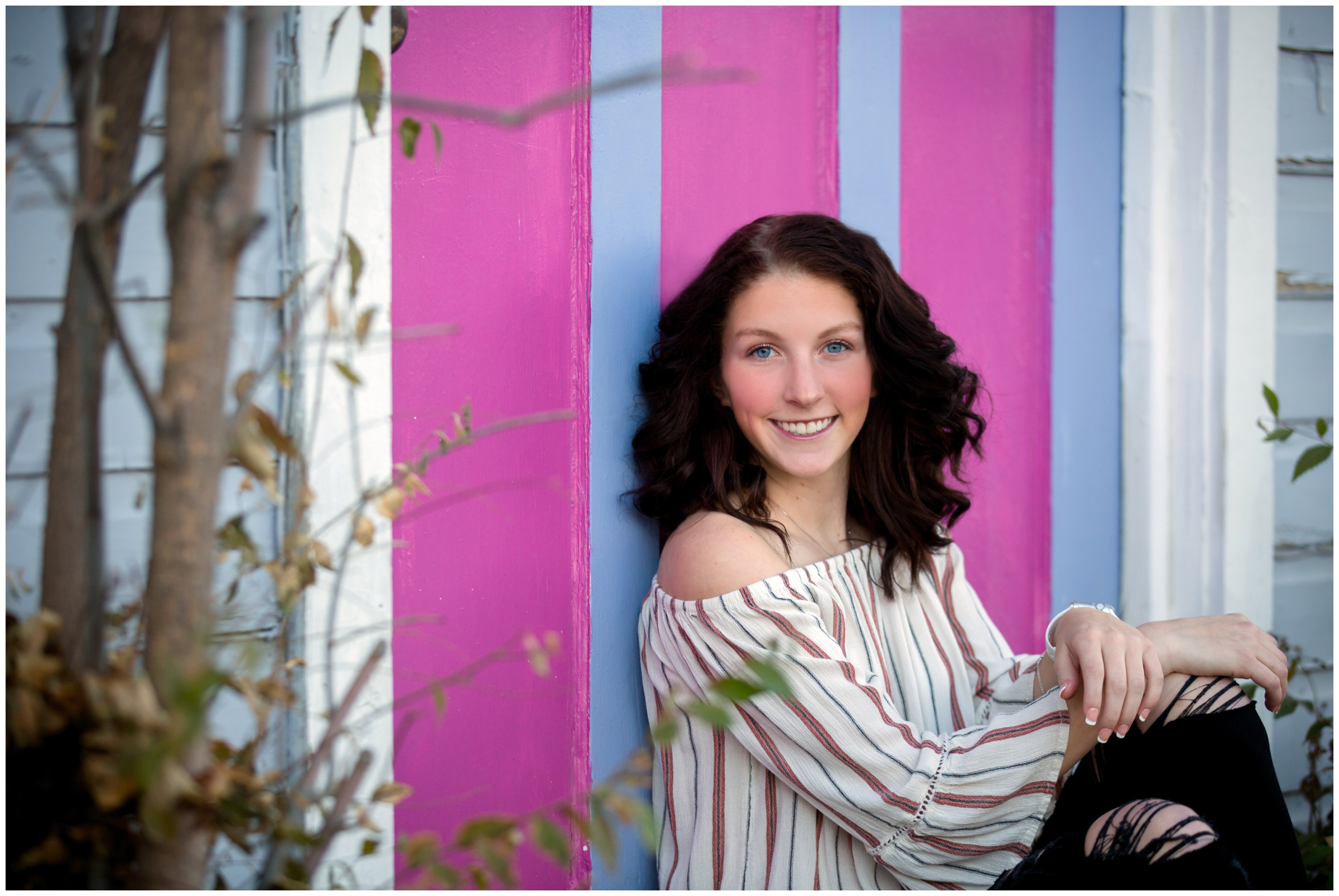 colorful, urban Mead senior portraits in downtown Niwot by Colorado photographer Plum Pretty Photography