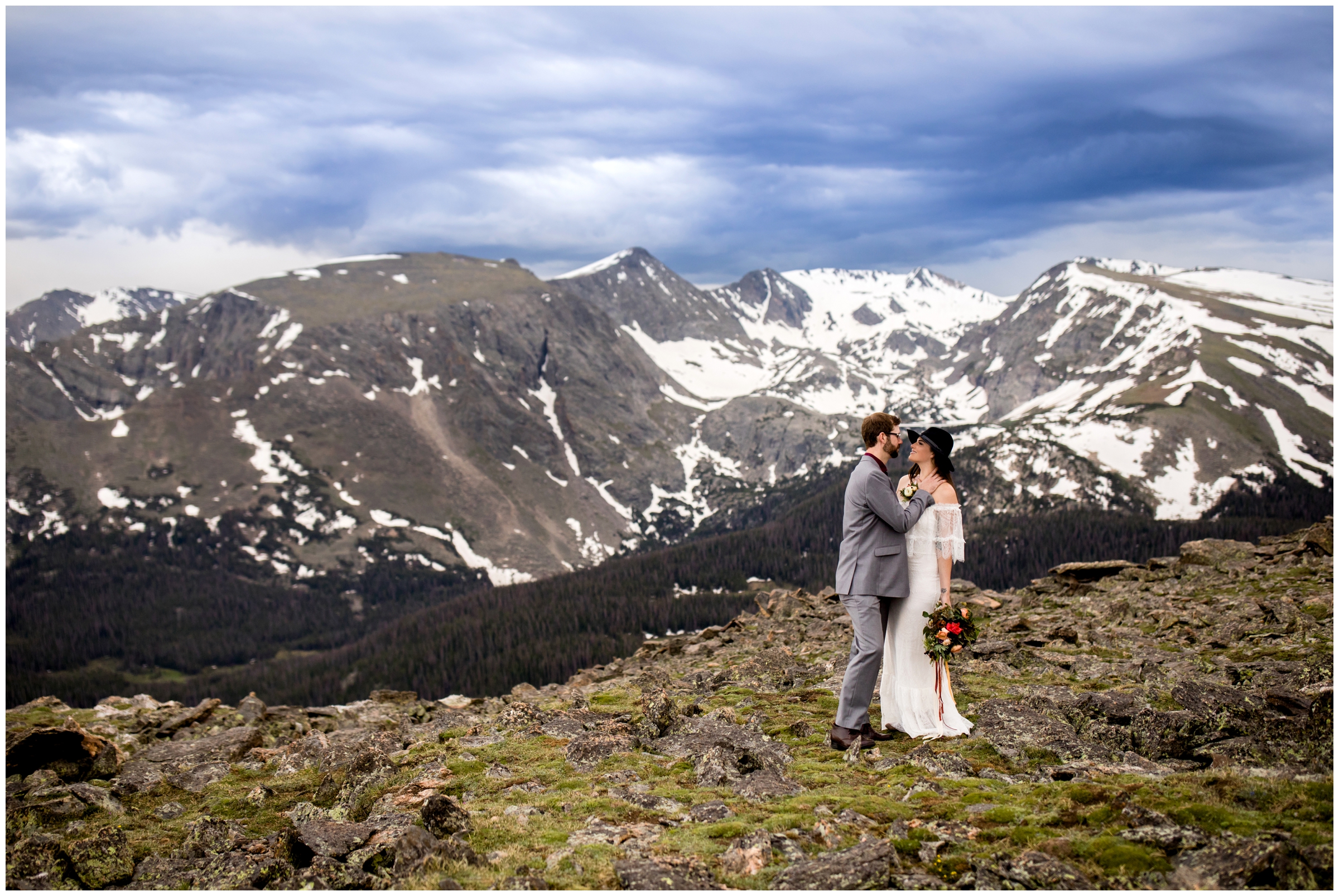 colorado engagement portraits on trail ridge road with mountains in background 