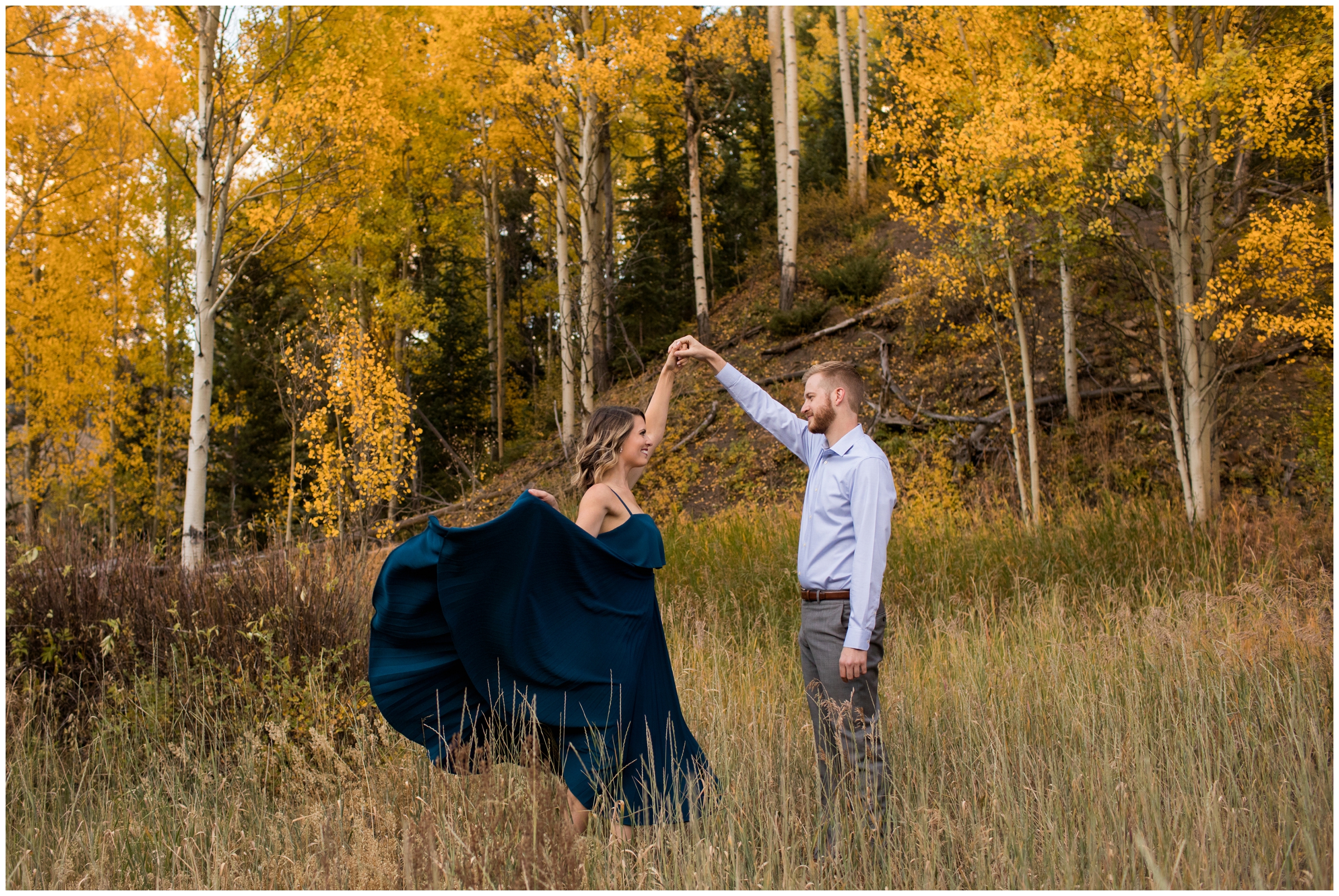 women spinning in flowy dress during Breckenridge engagement photography session at Sawmill Museum by Colorado mountain photographer Plum Pretty Photographer