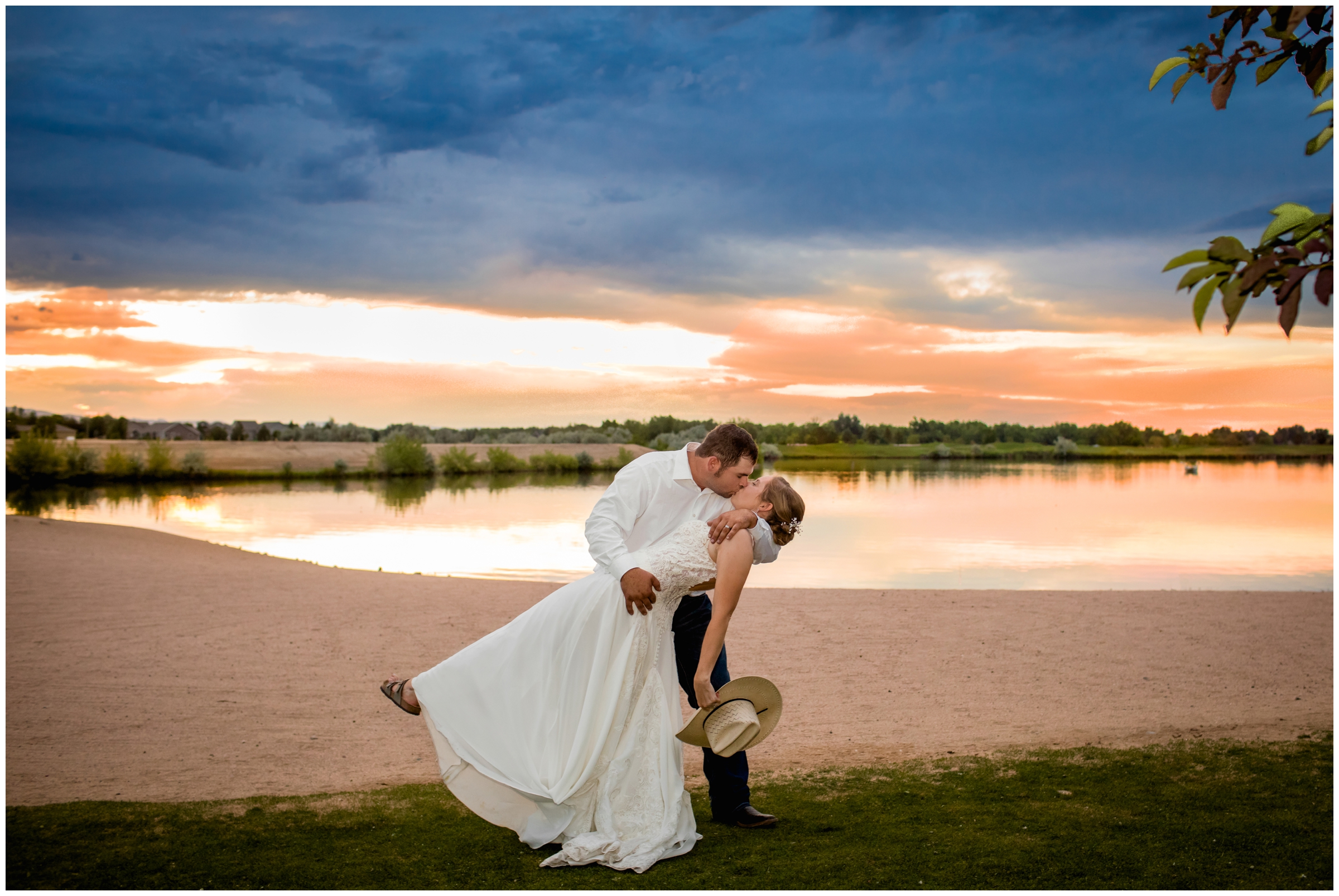 couple dipping and kissing at sunset at Pelican Lakes Golf Course wedding