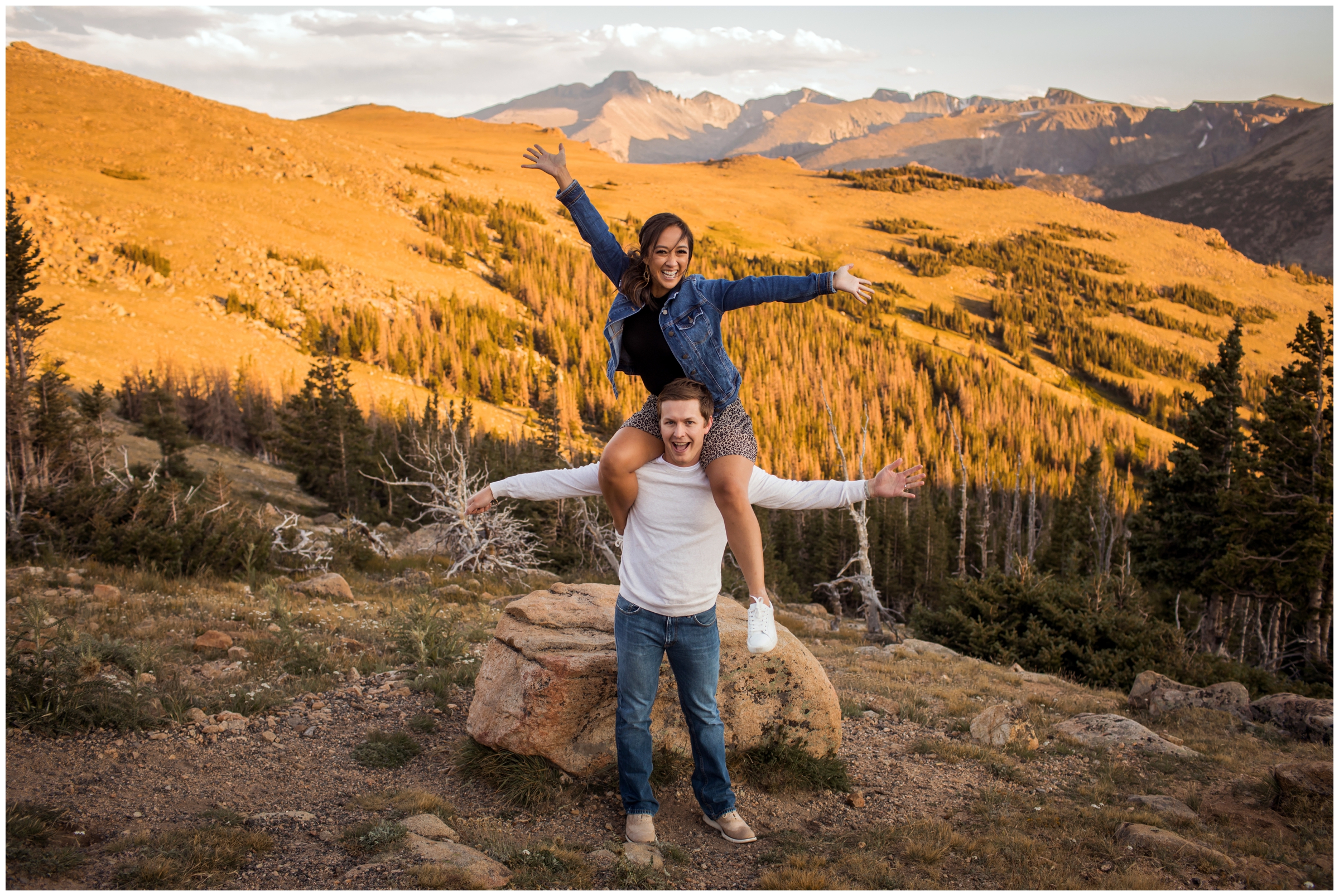woman on husband's shoulders during Estes Park Colorado anniversary couples photo shoot