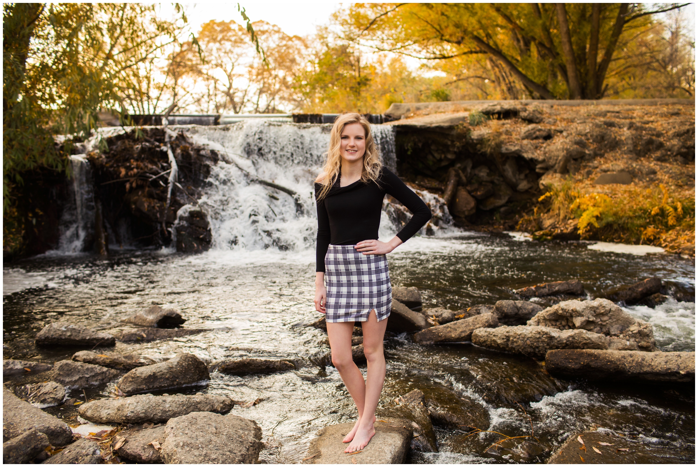 Golden ponds Longmont senior portraits by a waterfall 