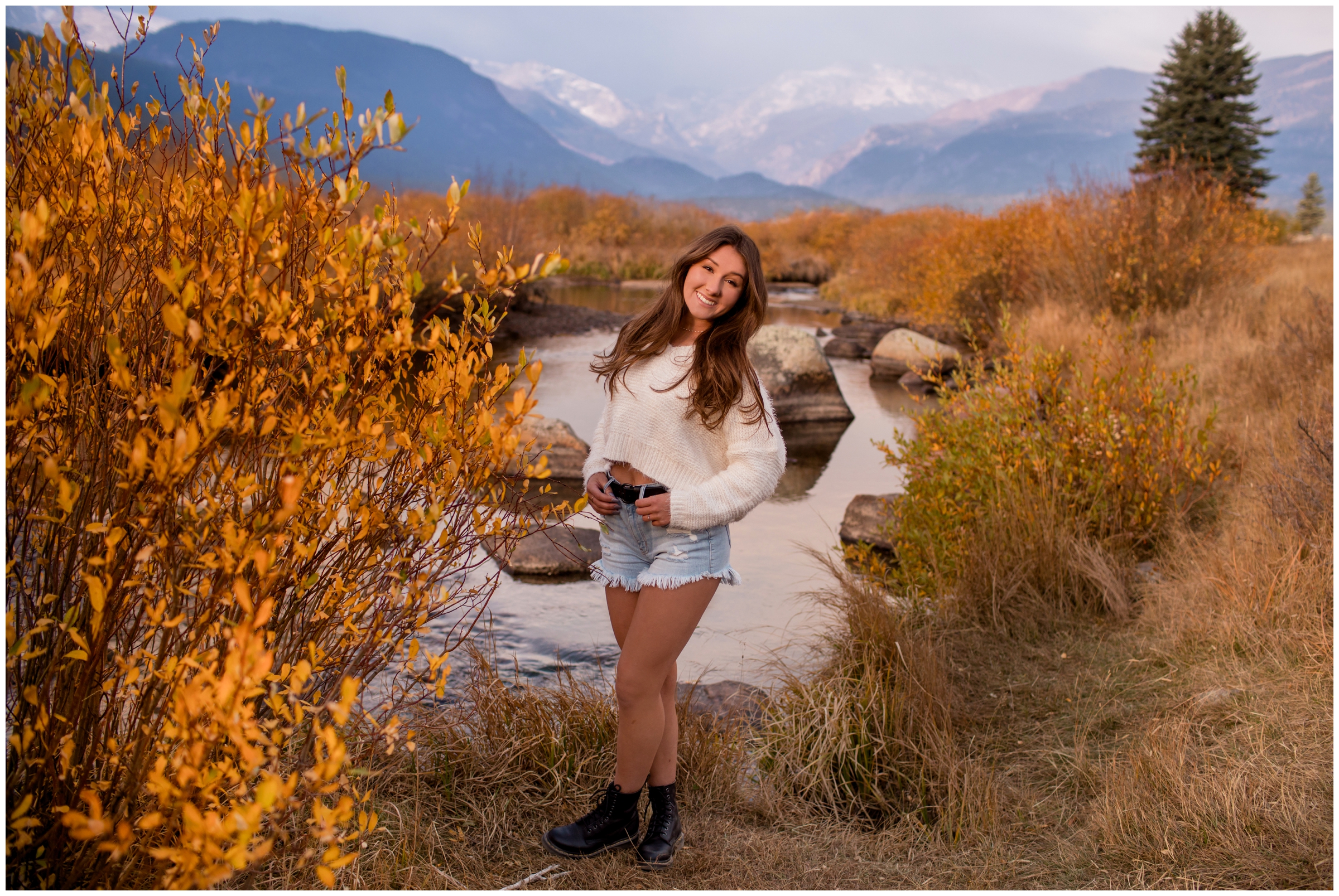 teen girl posing by river at Moraine Park during RMNP senior pictures 