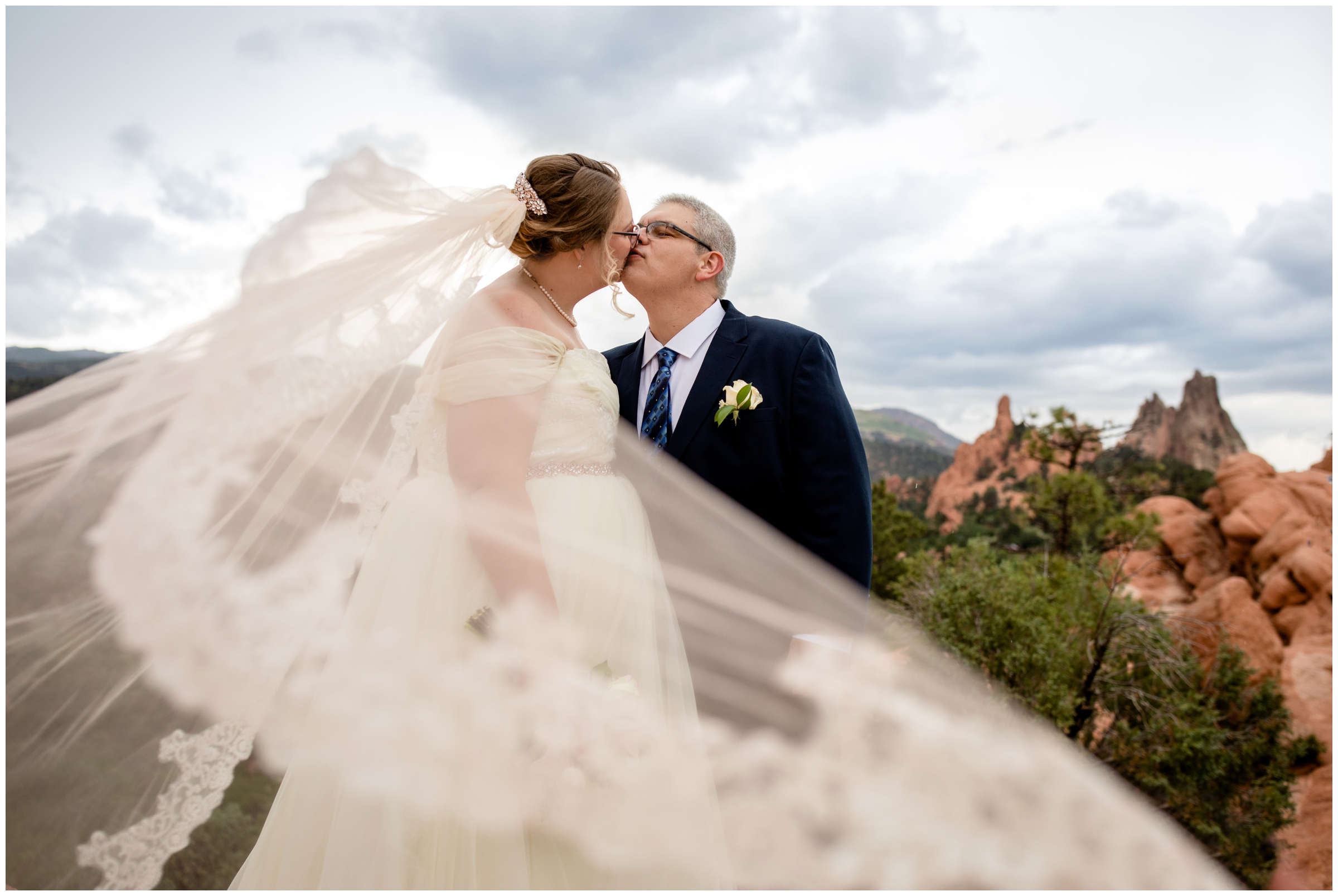 unique wedding photography with long veil at Garden of the Gods in Colorado Springs