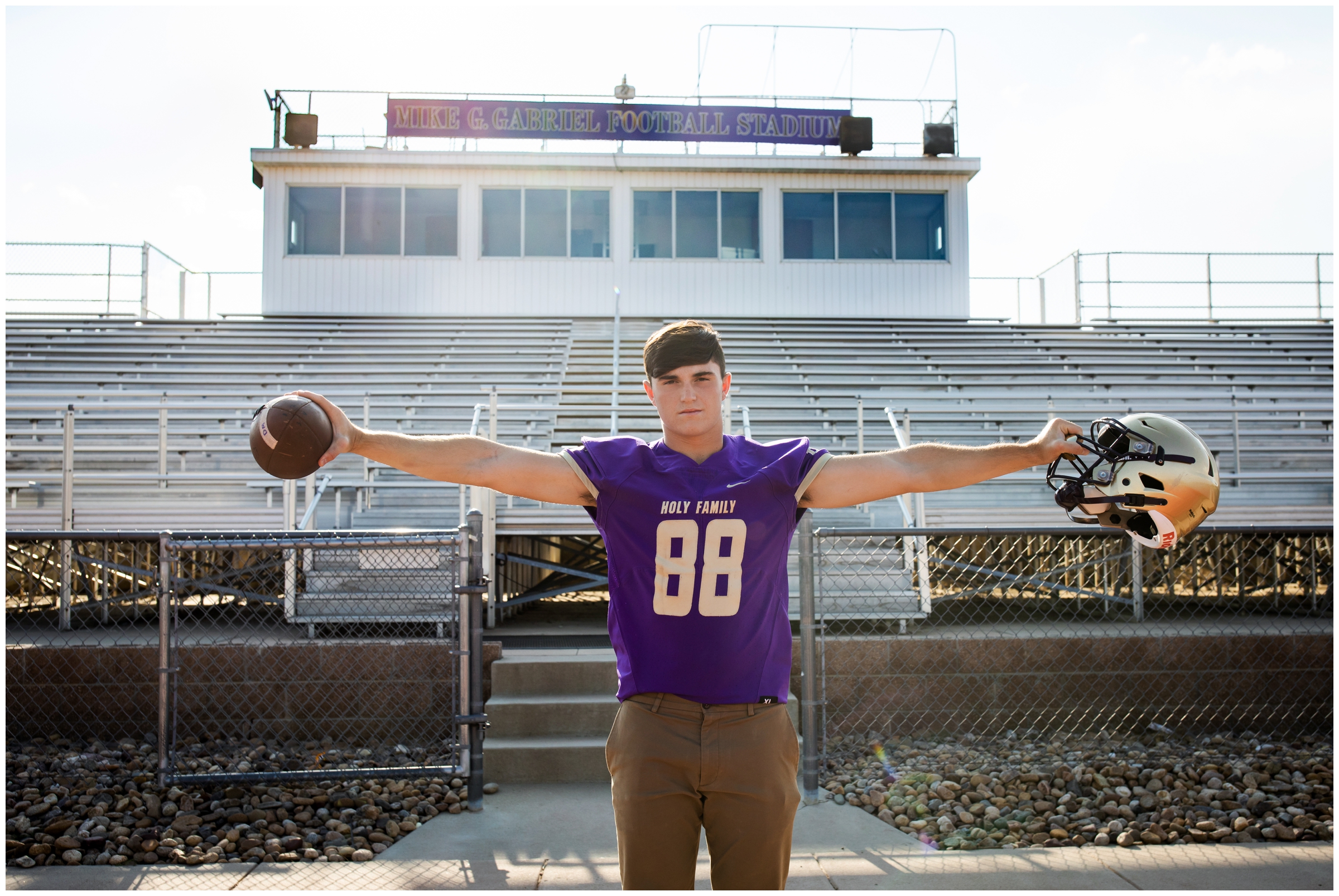 football senior photos at Holy Family High School in Colorado by Plum Pretty Photography 
