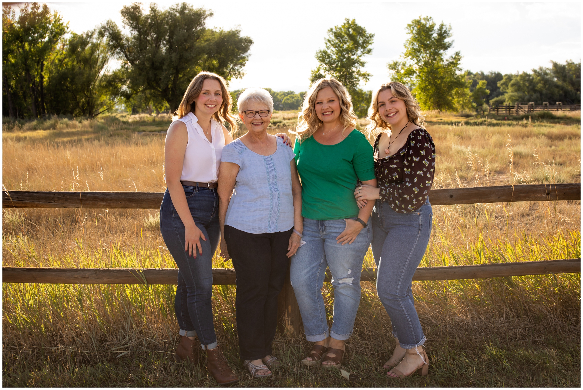 four generations of women posing for extended family photos in Longmont Colorado 