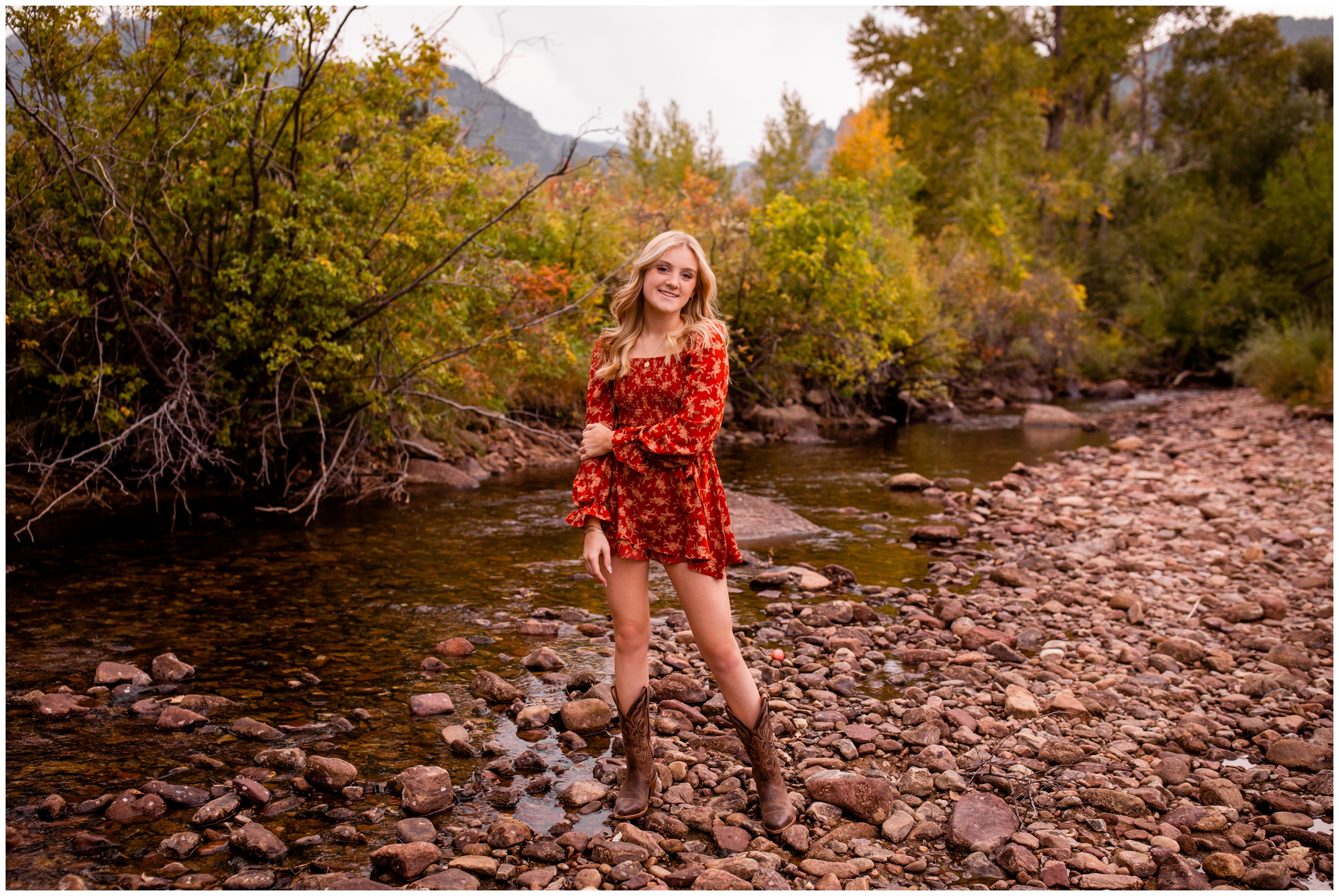 teen girl posing next to river during Boulder Colorado senior photography session
