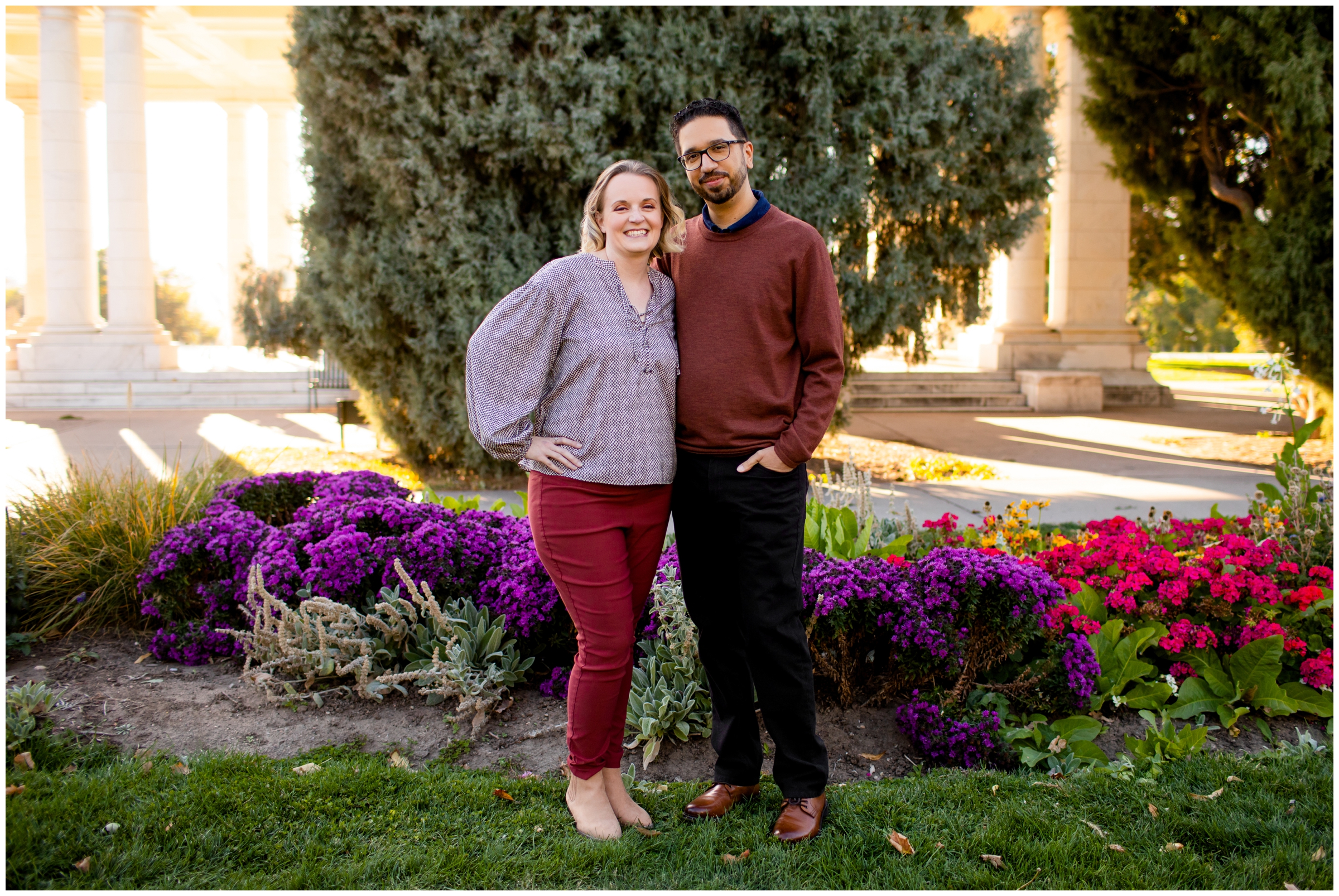 couple posing in flower gardens at Cheesman Park in Denver 