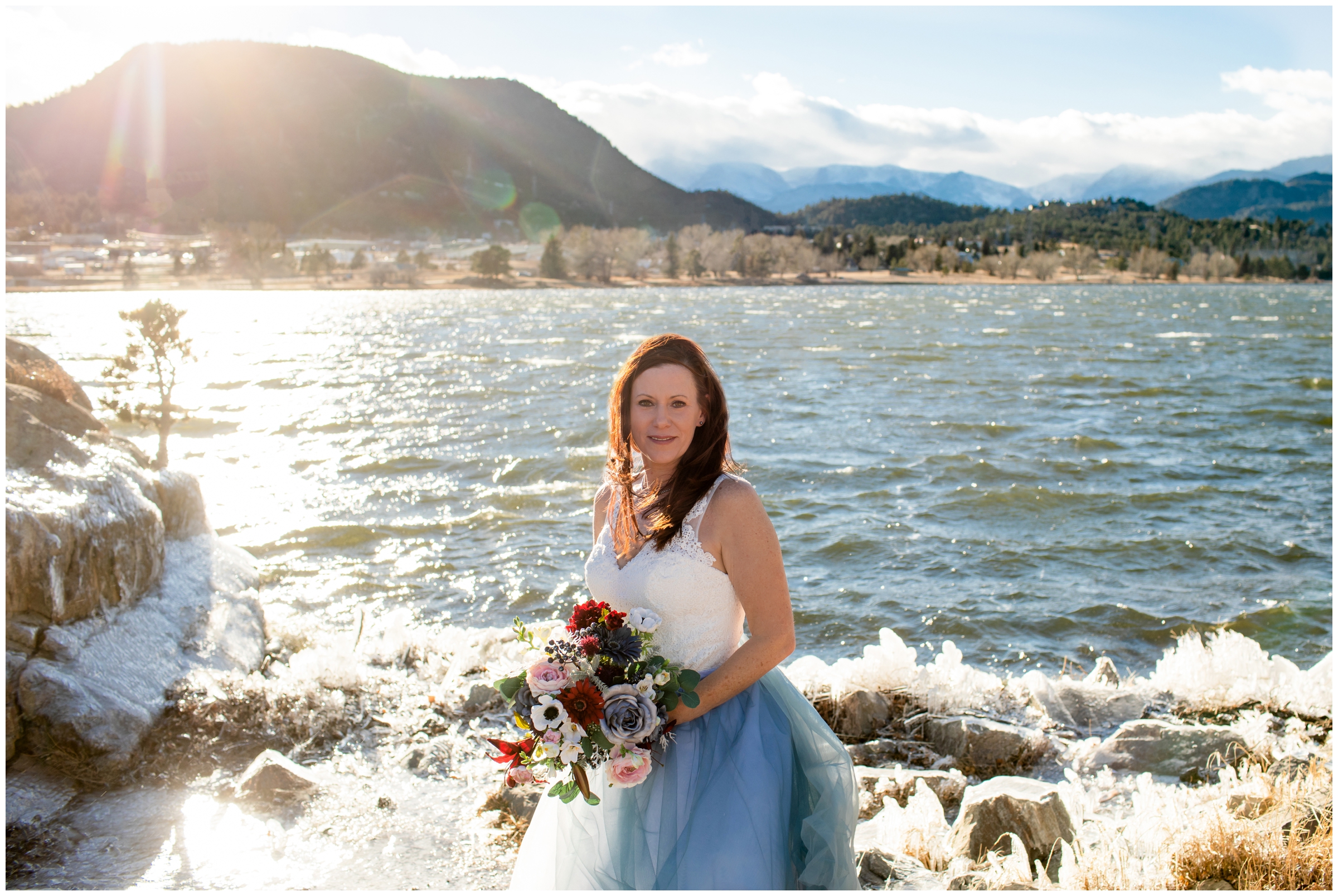 bride in blue ombre skirt posing for Estes Park Resort winter wedding photos