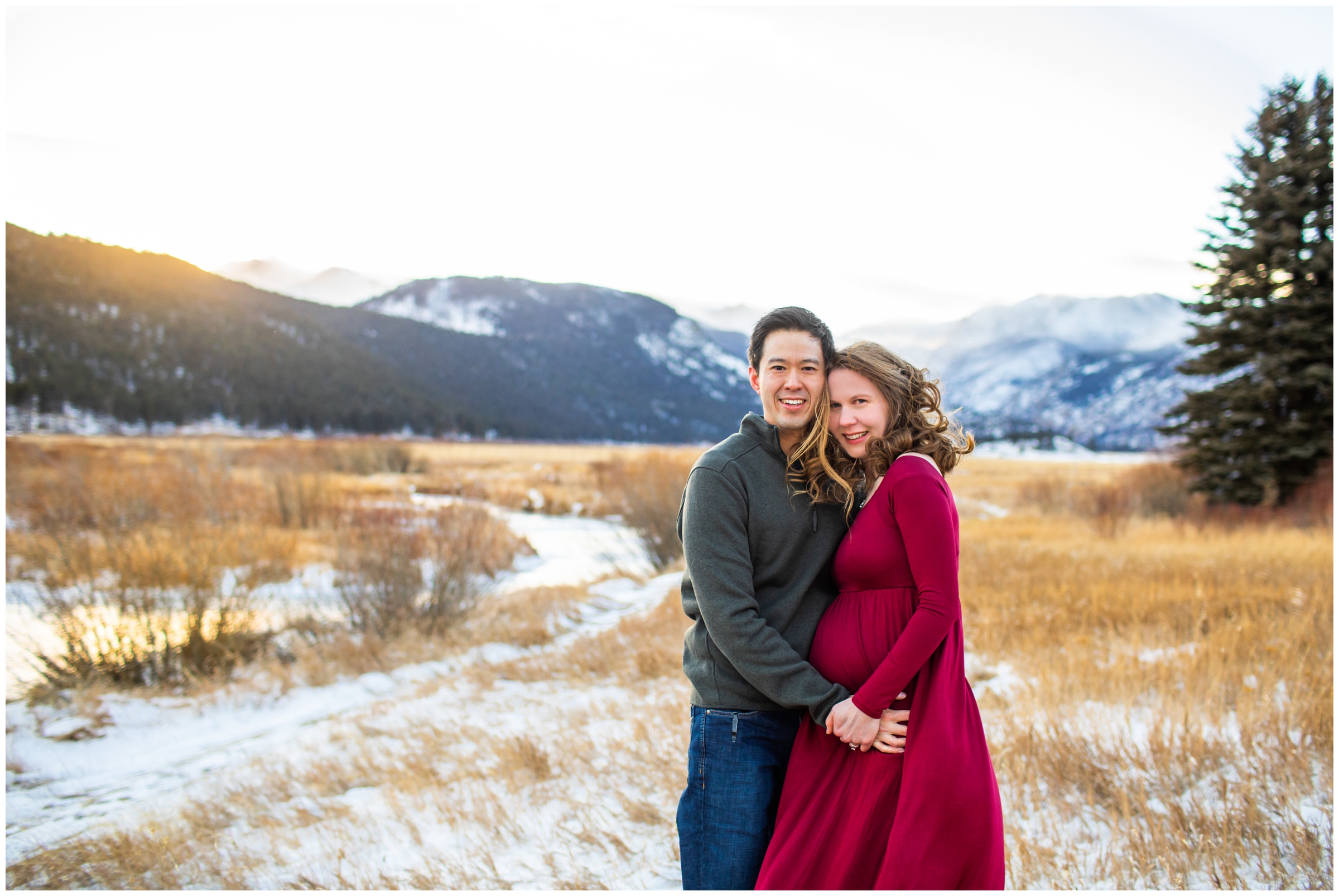 snowy winter maternity portraits at Moraine Park in Estes Park Colorado 