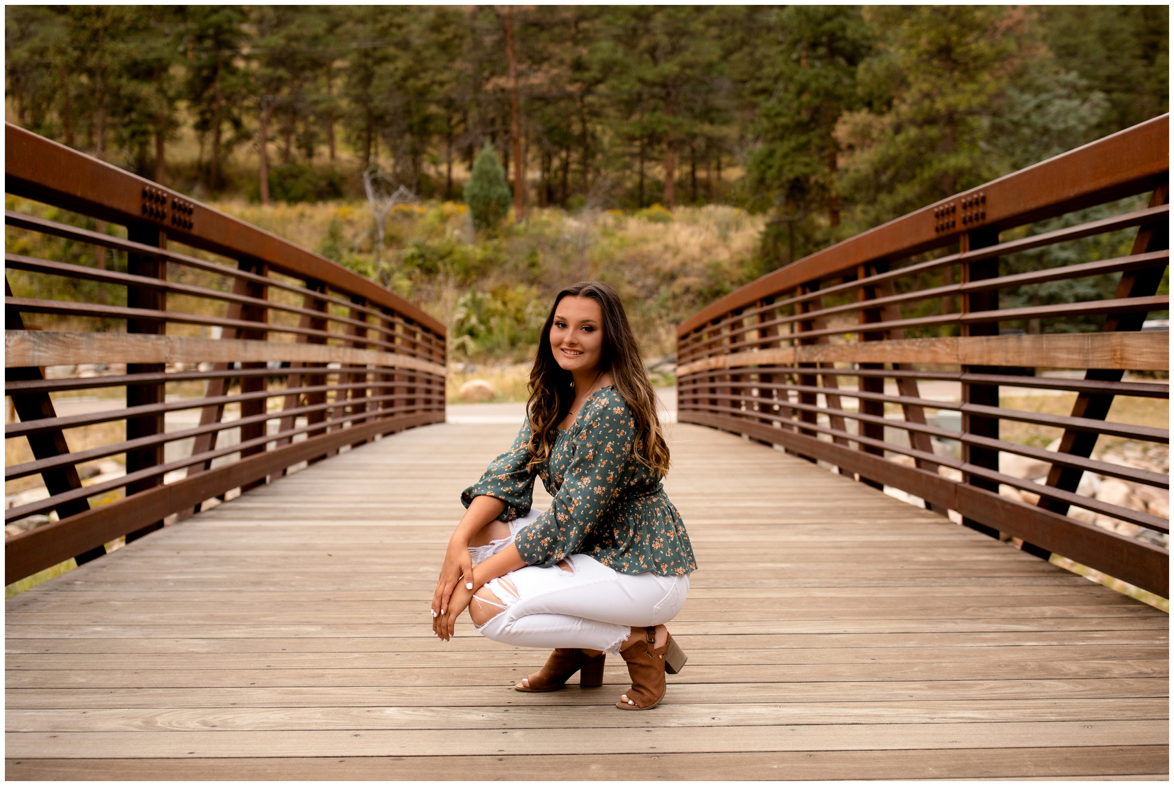 teen girl posing on bridge during Loveland Colorado senior photos