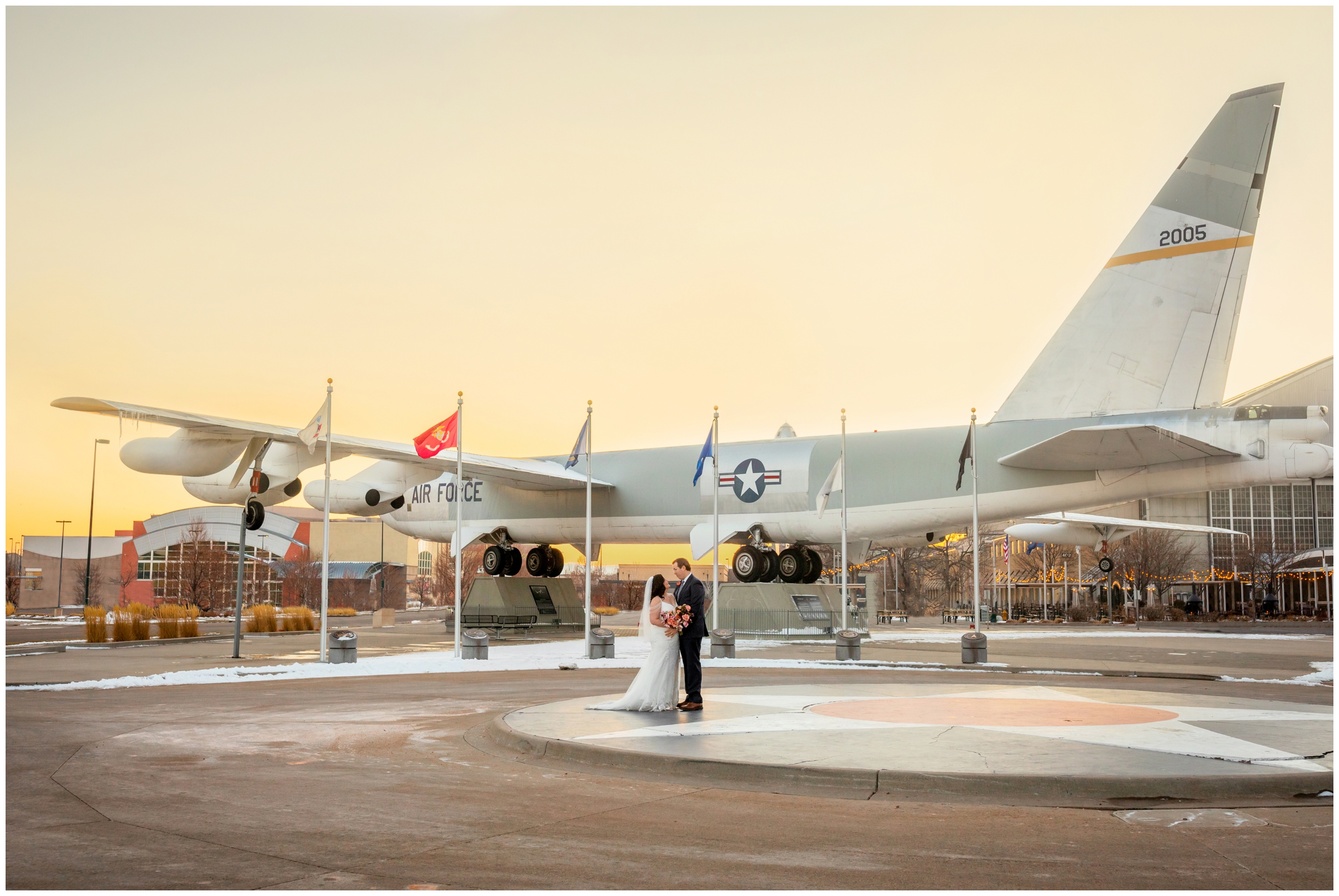 unique wedding photos at the Wings Over the Rockies airplane museum venue by Plum Pretty Photography