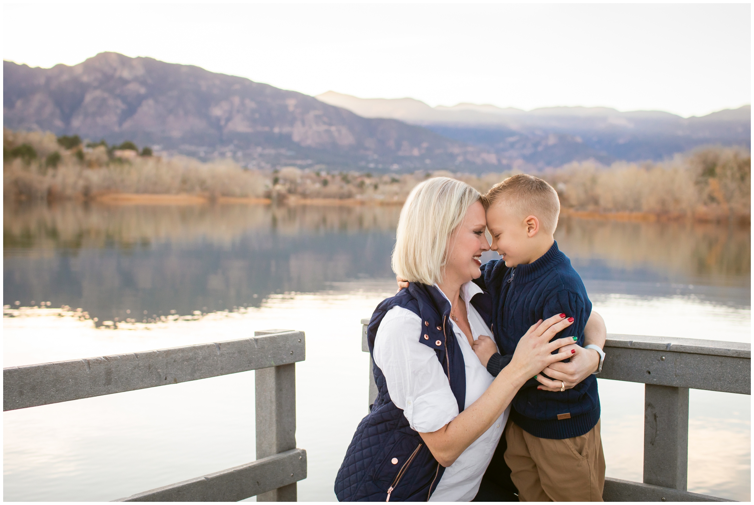 sweet candid moment between mom and son during lake family photos in Colorado Springs 