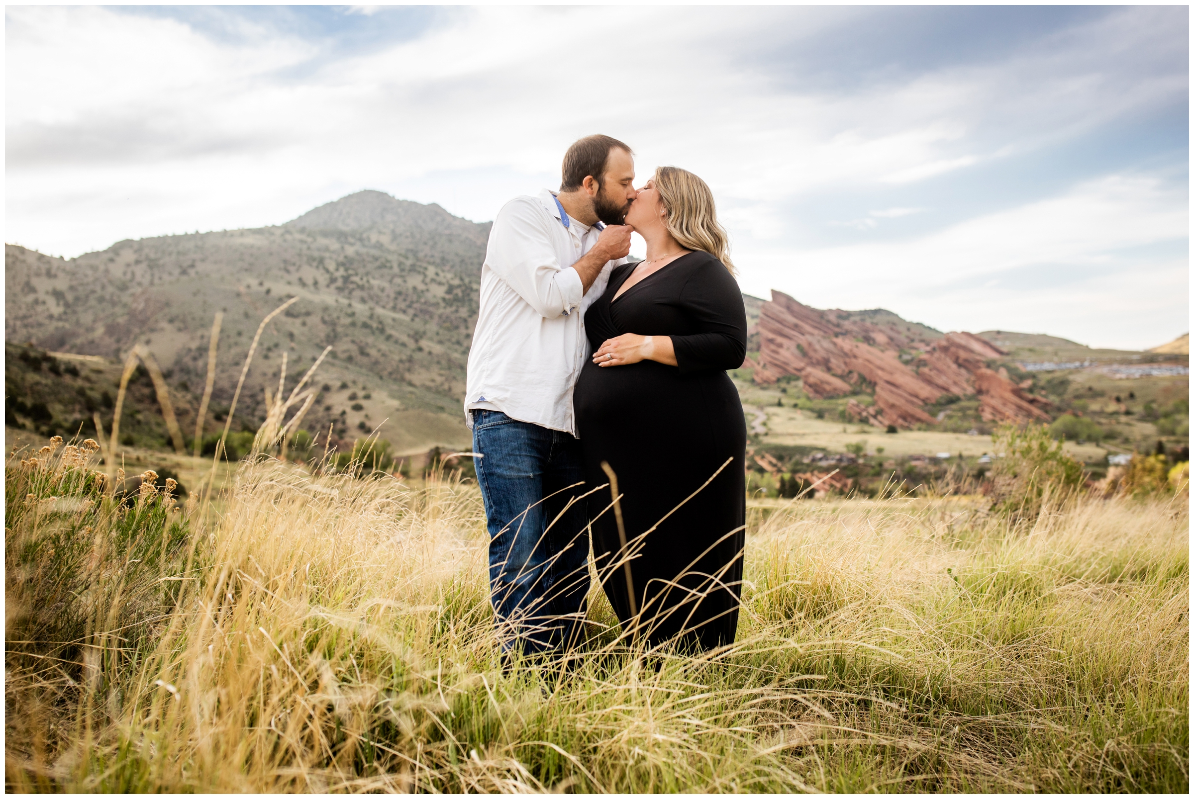couple kissing during maternity photo shoot in Morrison Colorado 
