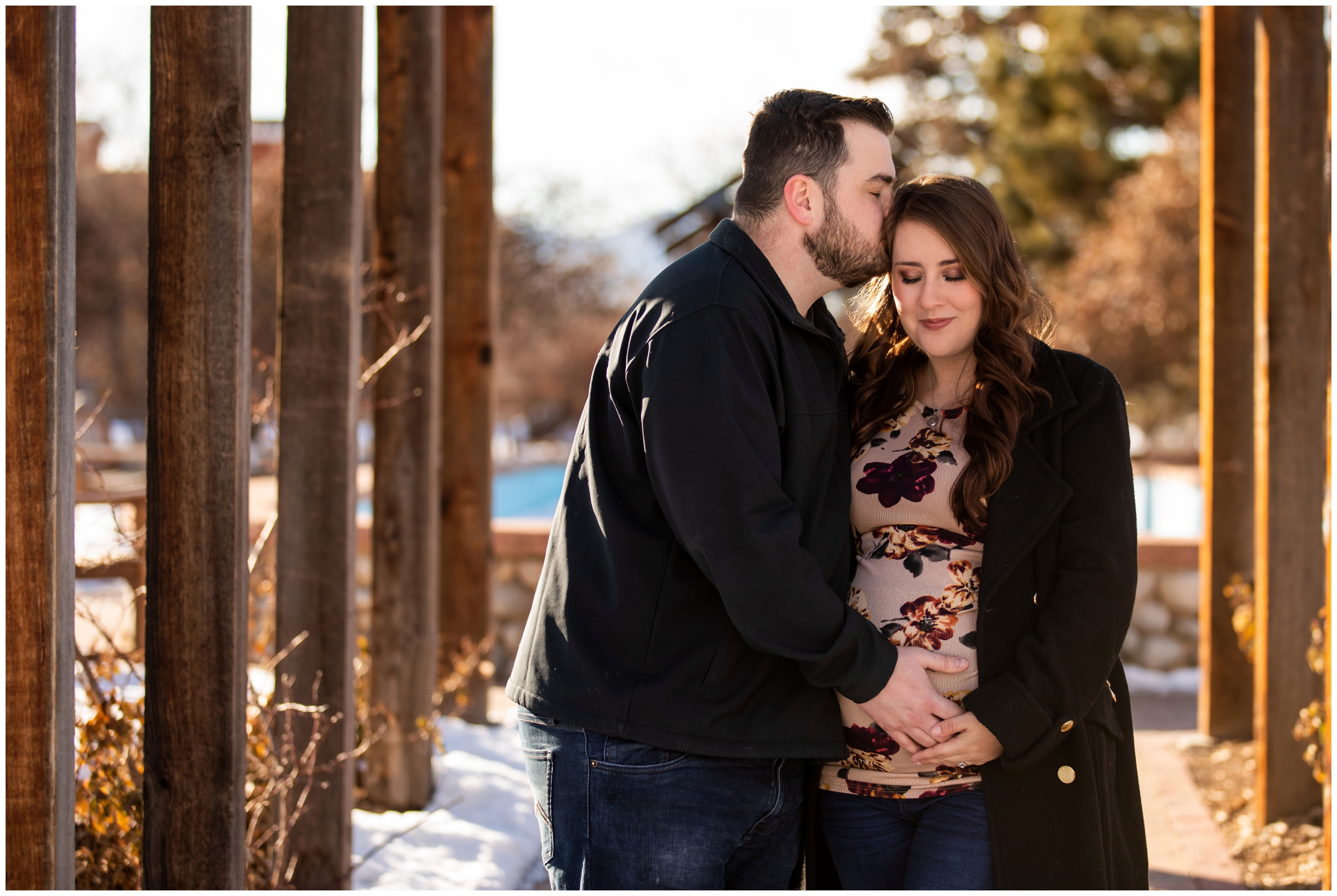 Colorado winter maternity pictures at Hudson Gardens in the snow by Denver portrait photographer Plum Pretty Photography