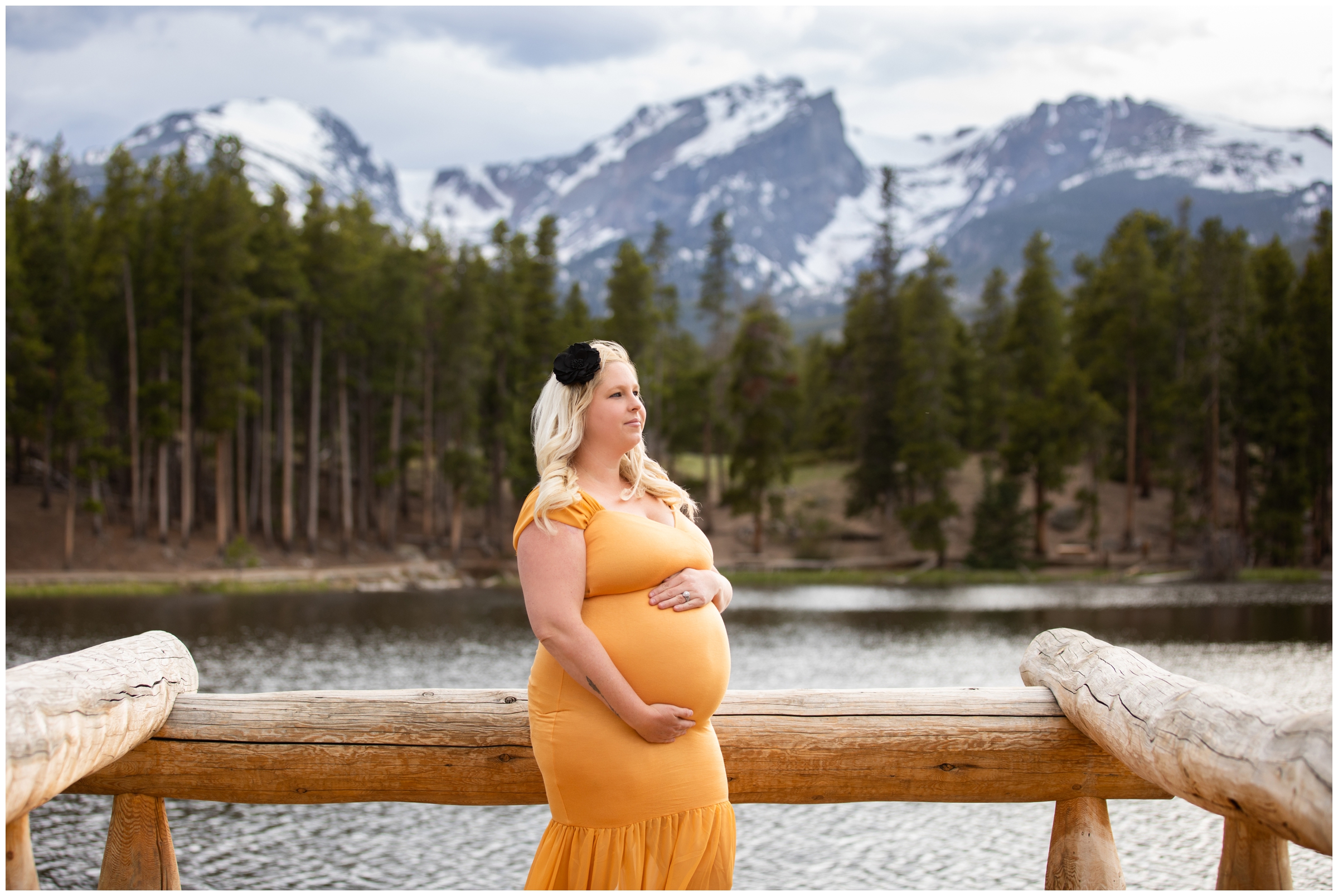 Estes Park pregnancy photo session on the dock at Sprague Lake in RMNP