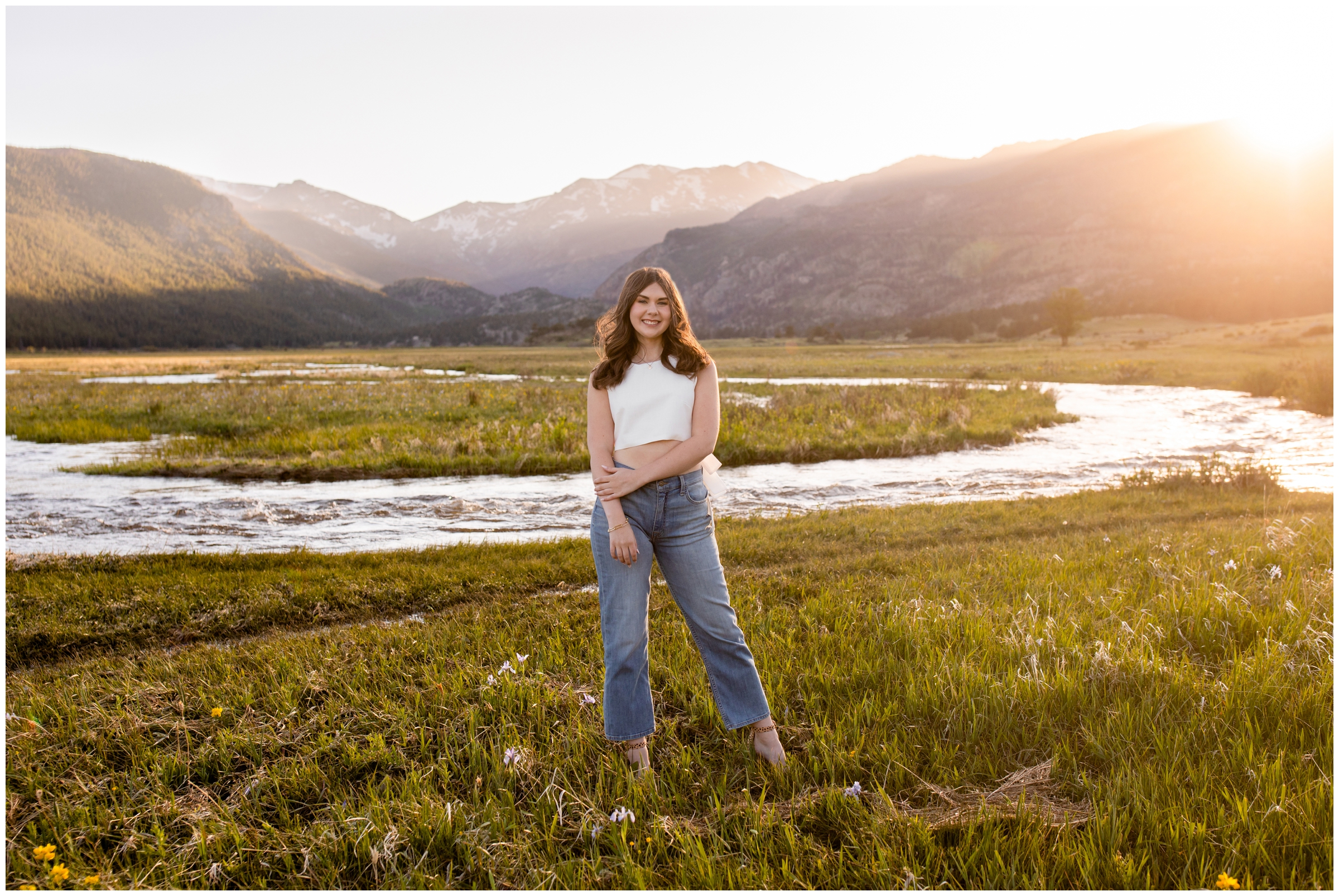 teen posing by the river during sunset senior portraits in RMNP Estes Park 