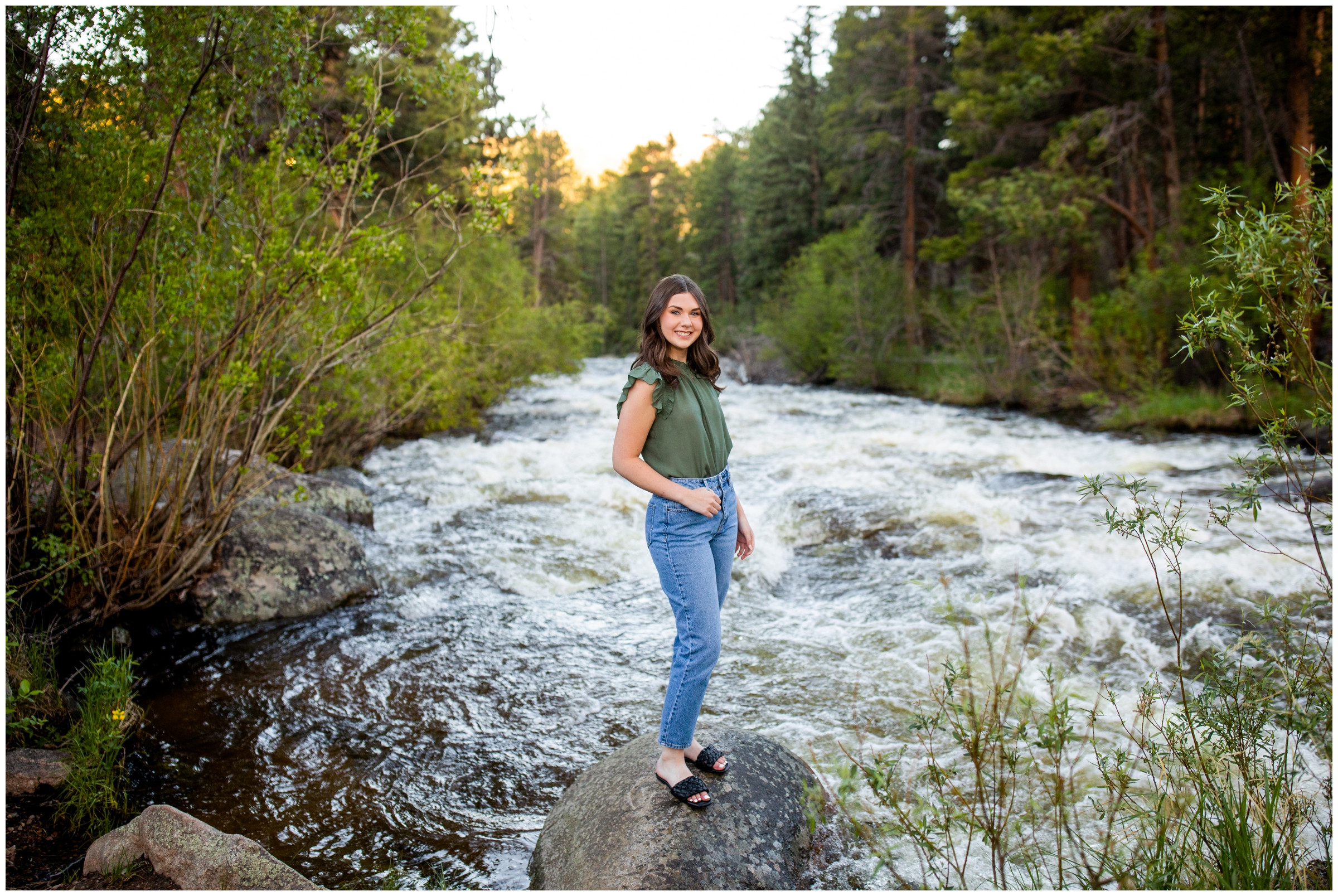 teen posing by a river in RMNP during Estes Park senior portraits by Plum Pretty Photography