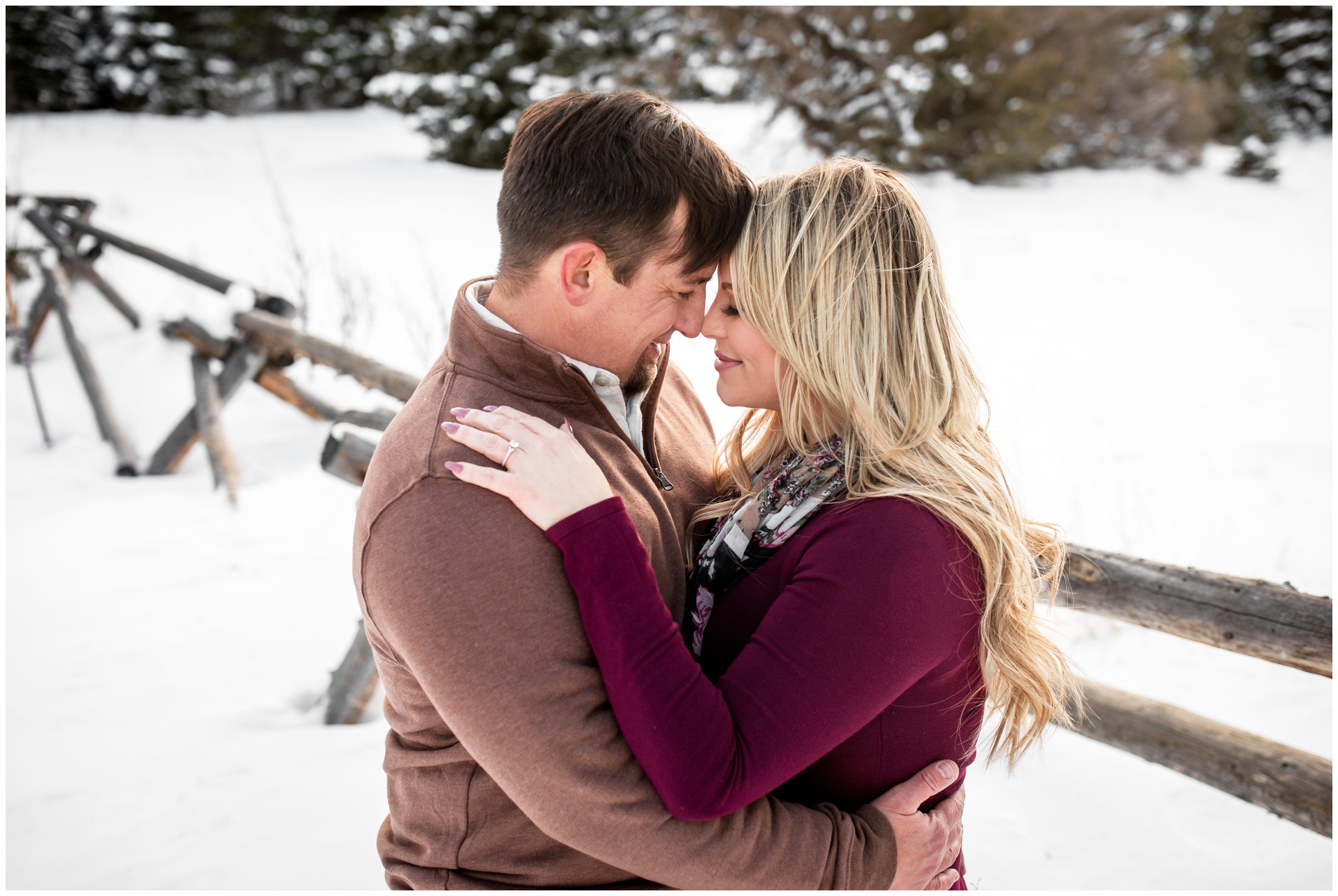 snowy couple's portraits in Colorado mountains at Frosberg Park in Evergreen 