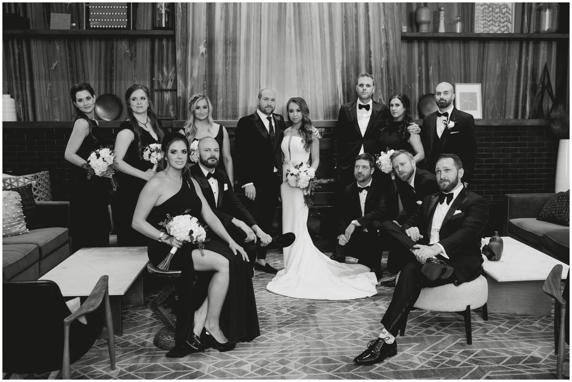 edgy bridal party photos in the lobby of the Halcyon Cherry Creek during Denver wedding portraits 