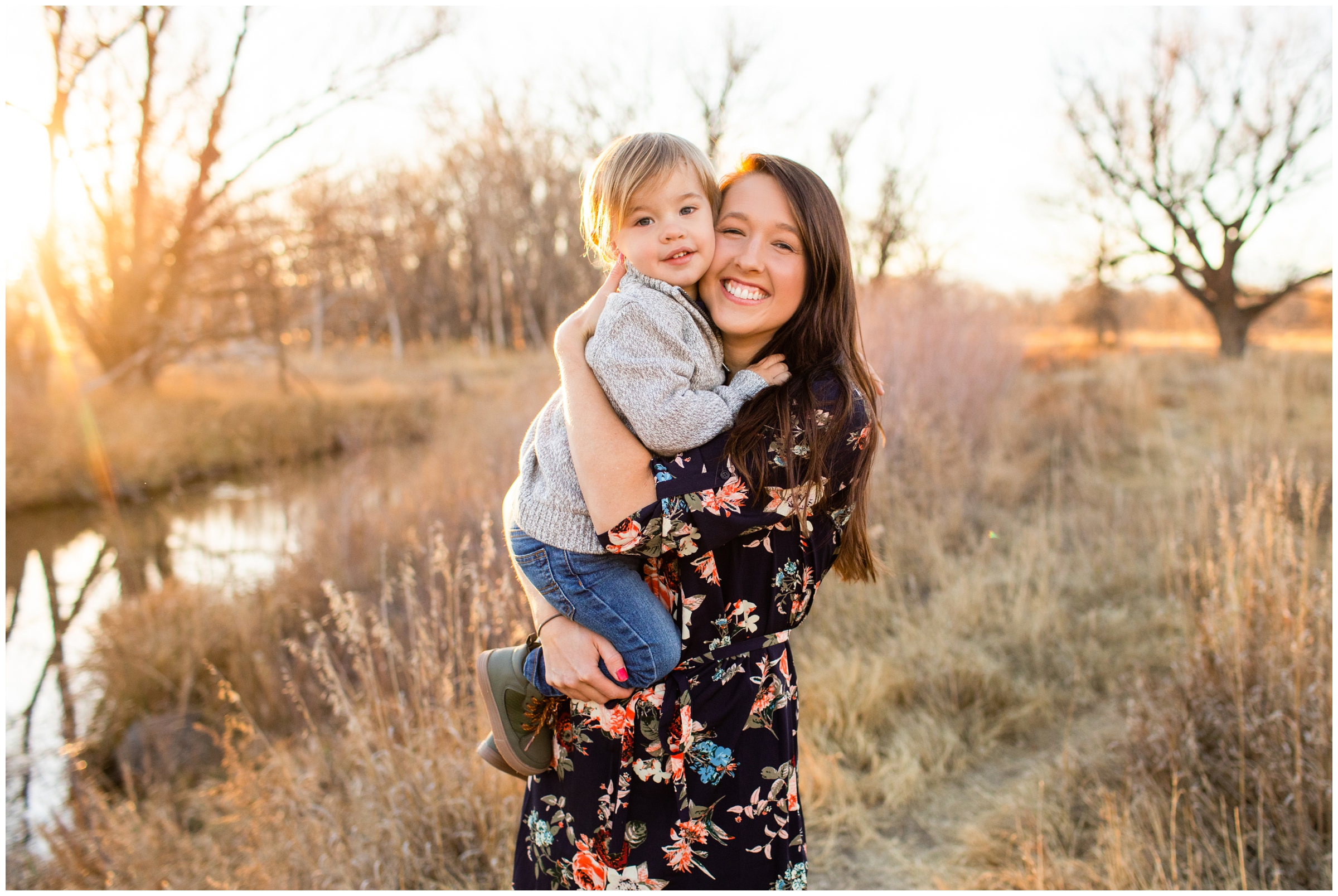 mom and son hugging during fall family photography session at Sandstone Ranch in Longmont