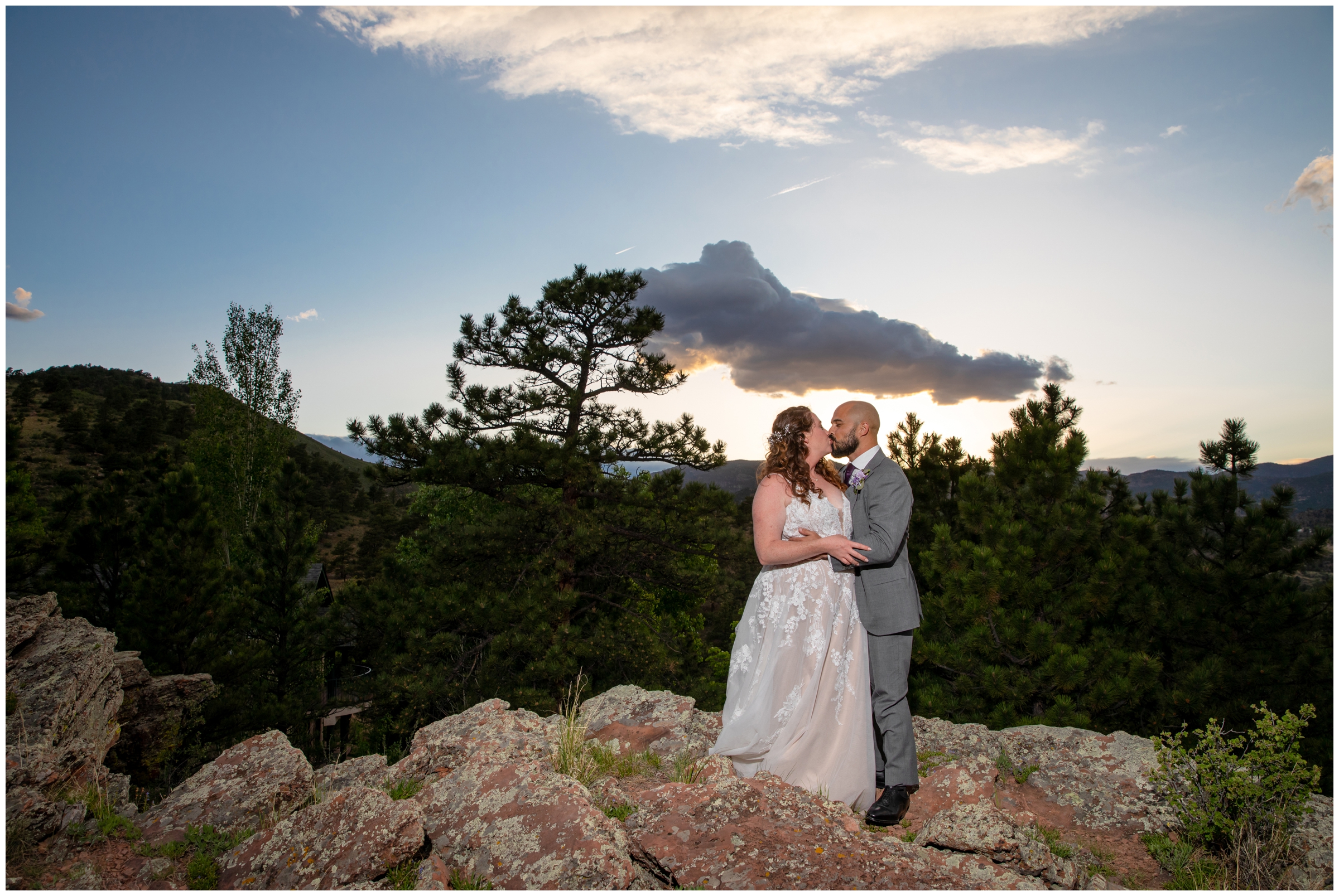 couple kissing under sunset sky at Lyons Colorado mountain wedding