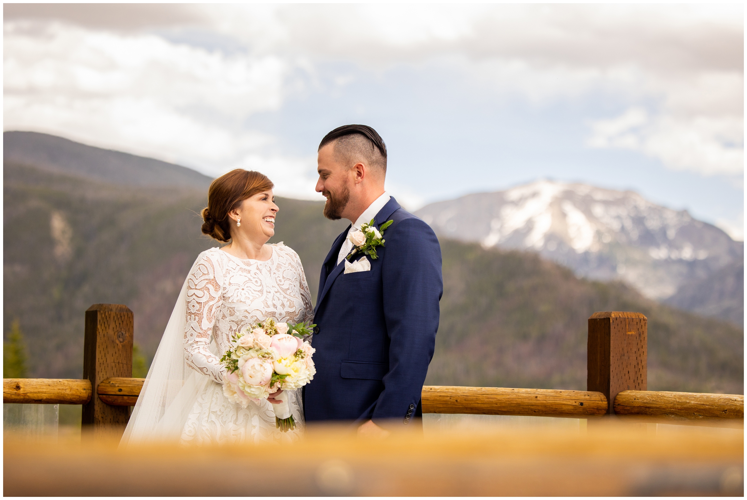 Colorado mountain wedding portraits on a wooden deck in Grand Lake 