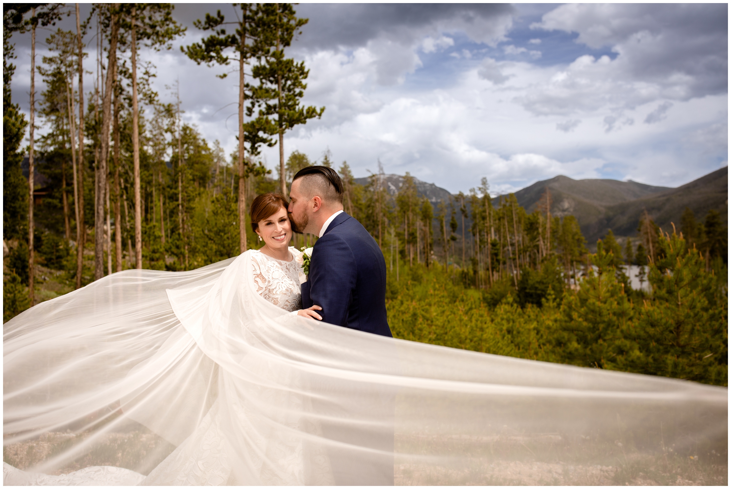 dramatic wedding veil photos during Grand Lake Lodge Colorado mountain wedding