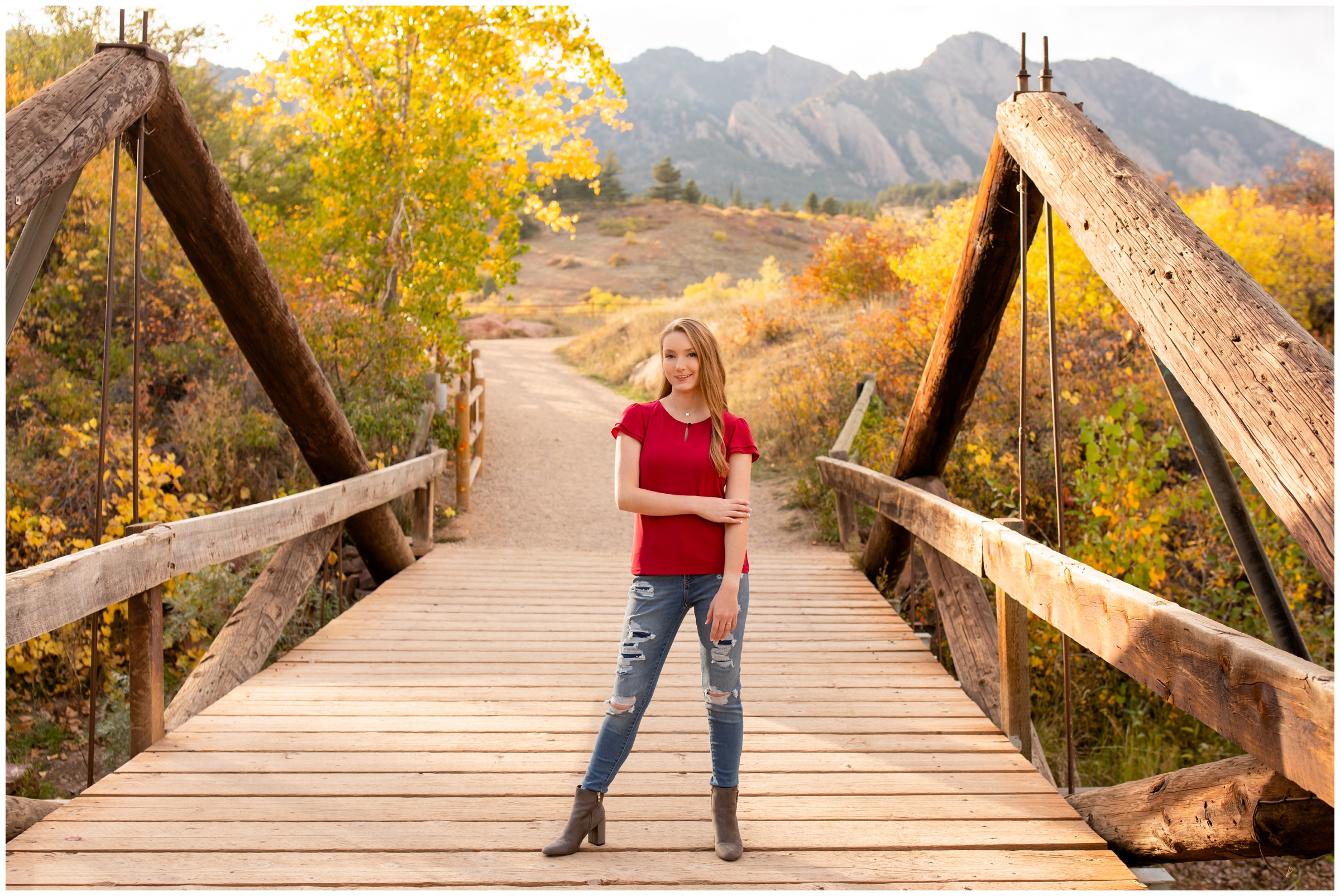 teen posing on wooden bridge at South Mesa Trail in Boulder
