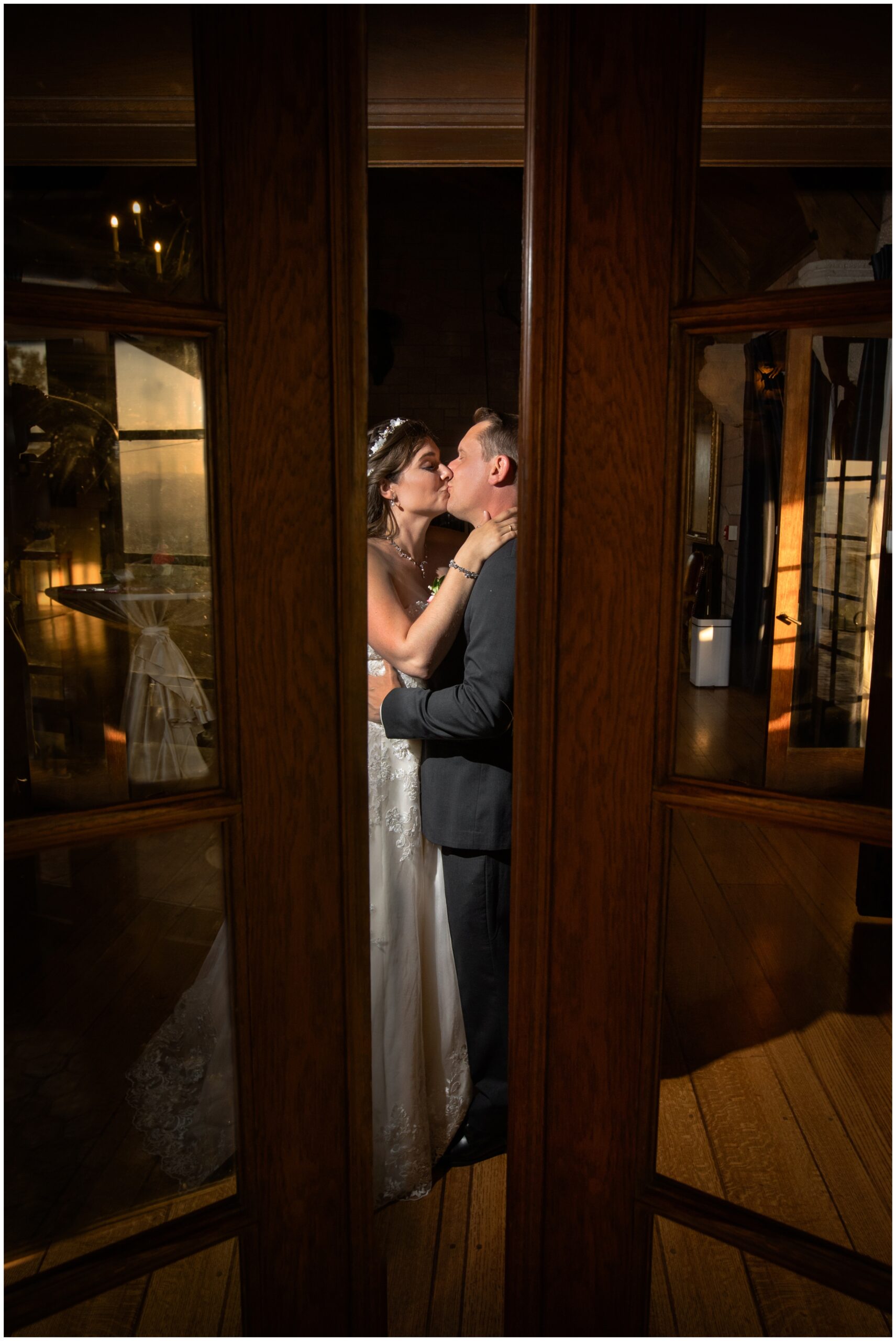 dramatic night photos in a castle during Colorado castle wedding photos in Sedalia 