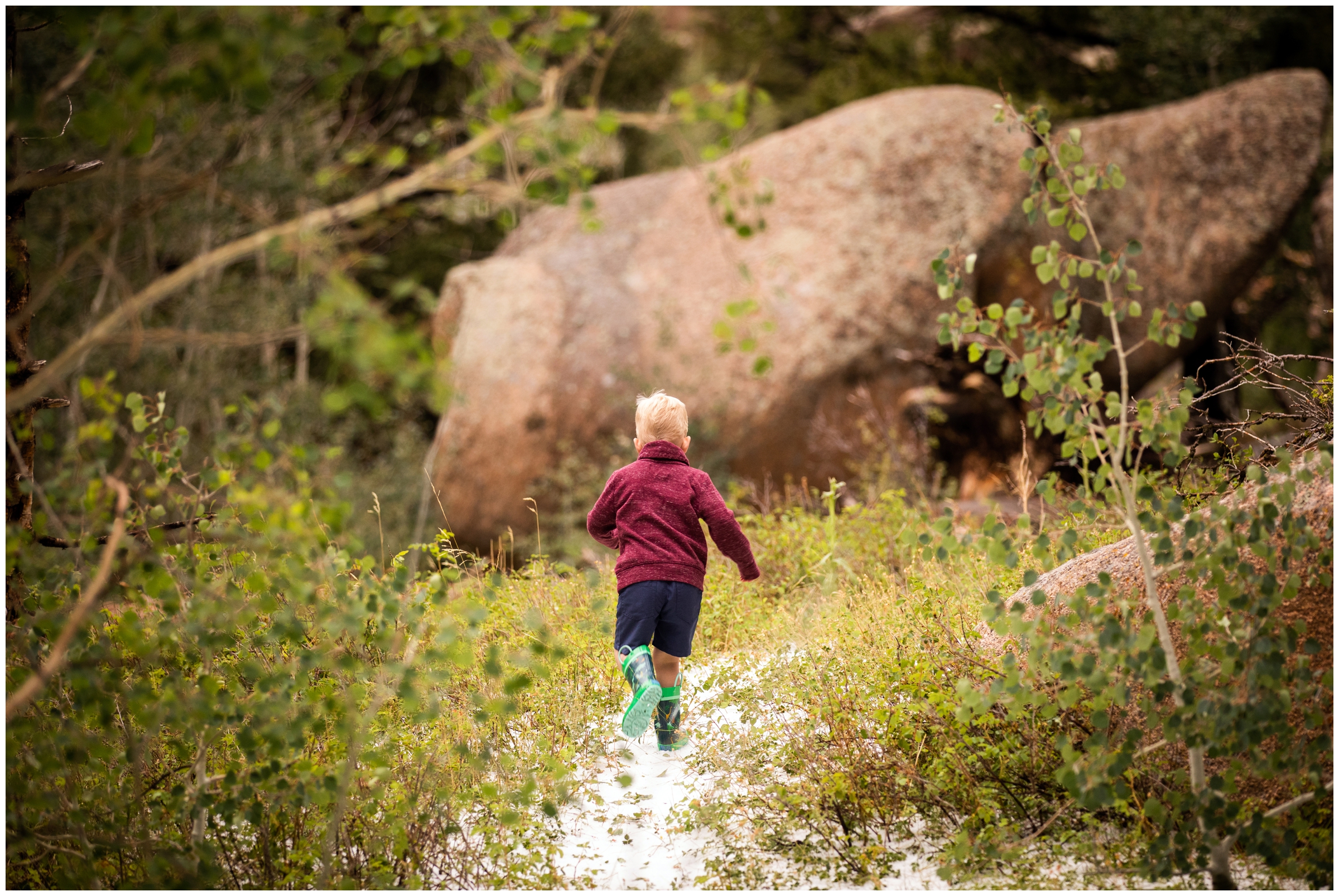 little boy running through snow during candid photography session by Colorado photographer Plum Pretty Photo