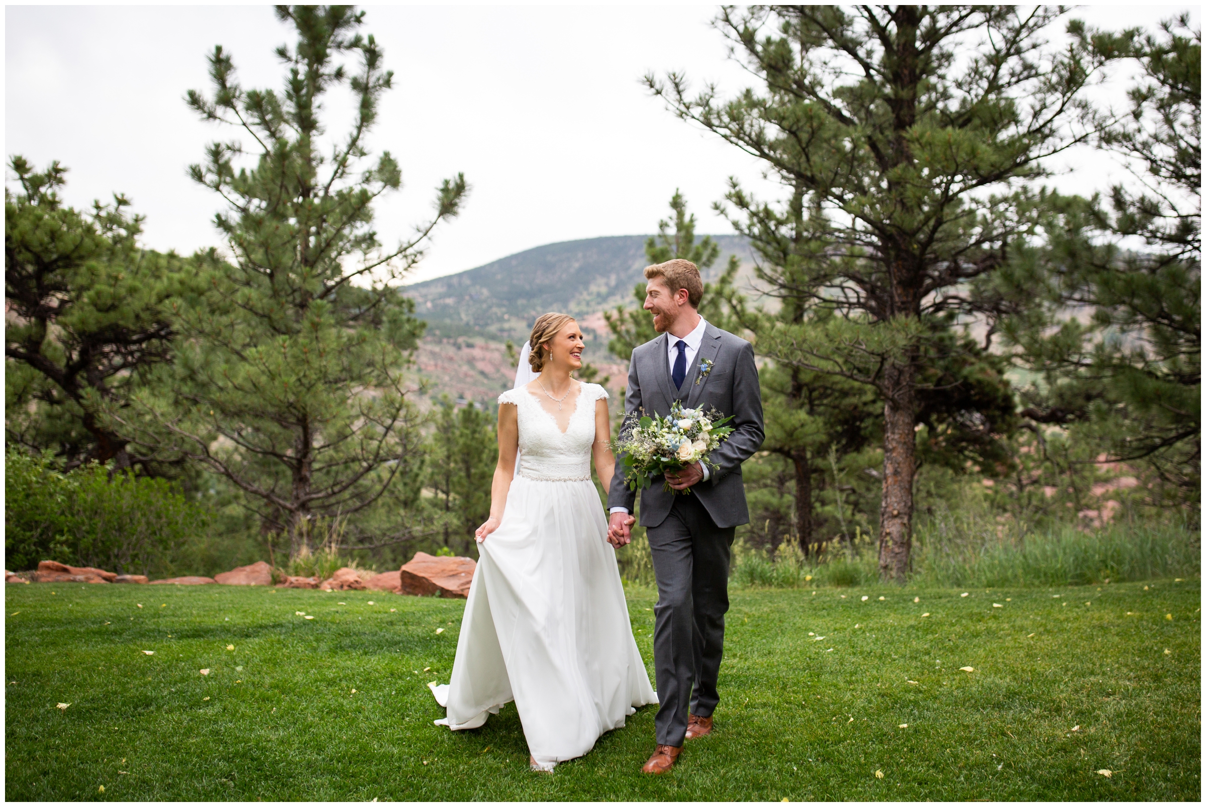 candid wedding photos of couple walking at Lionscrest Manor Colorado summer wedding portraits 