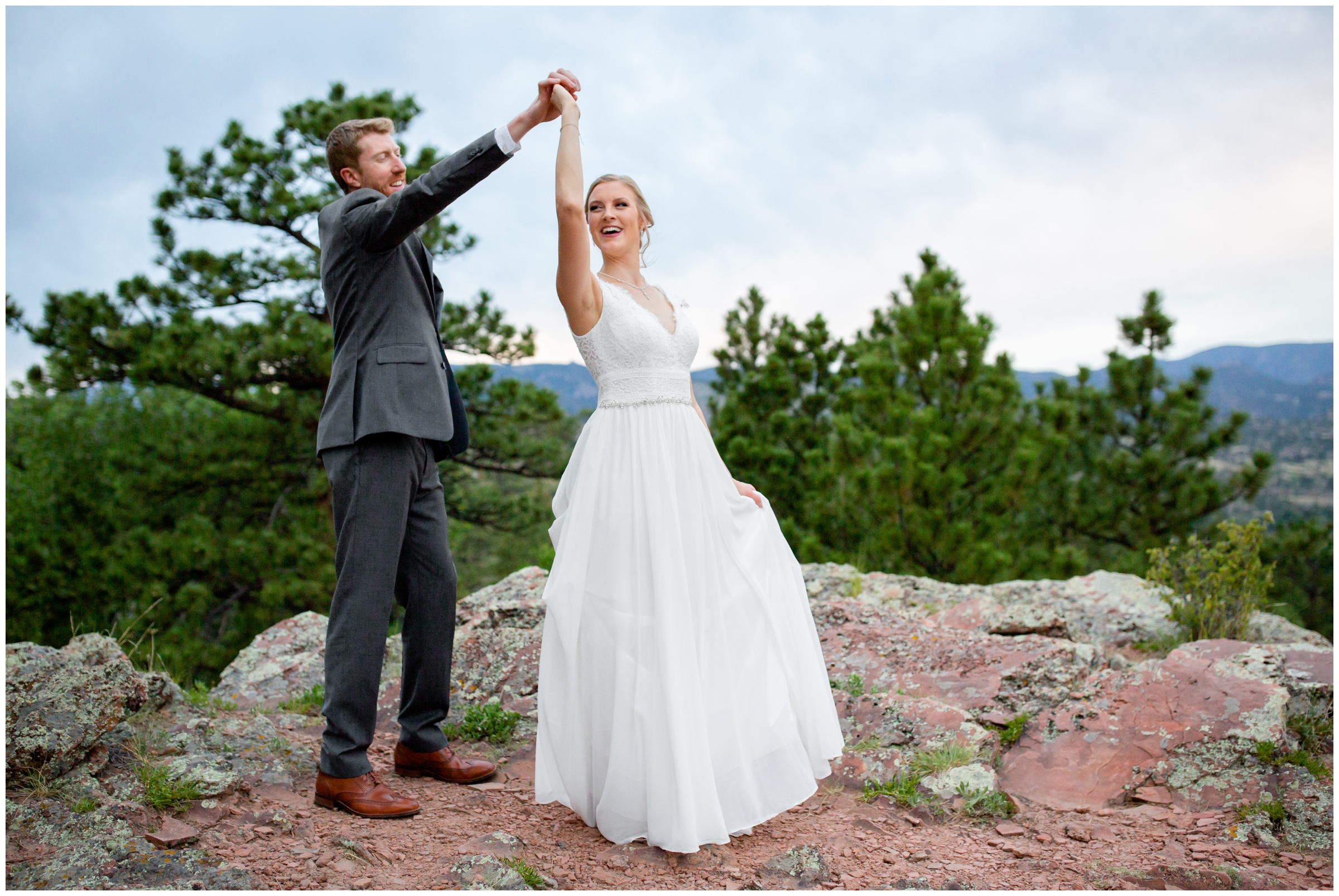 couple dancing on the edge of the mountain during Colorado summer wedding photos at Lionscrest Manor 