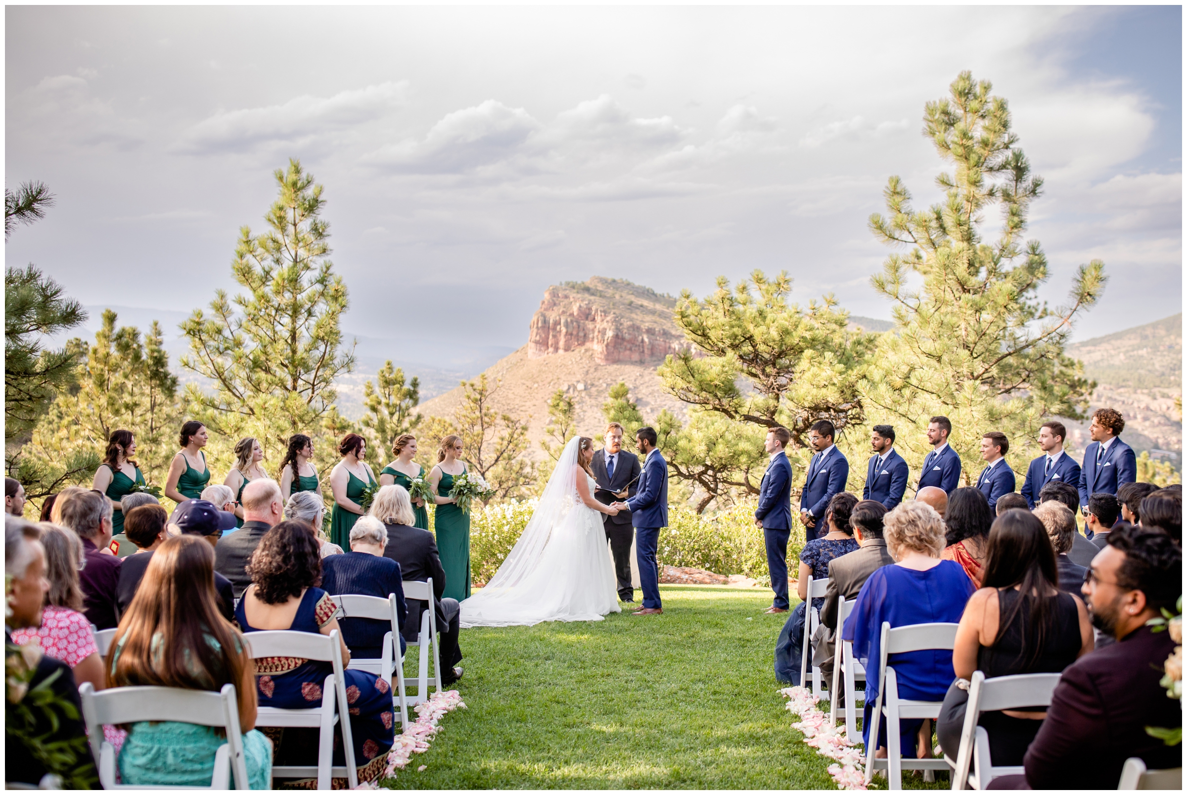 outdoor wedding ceremony with mountains in background at Lionscrest Manor Colorado