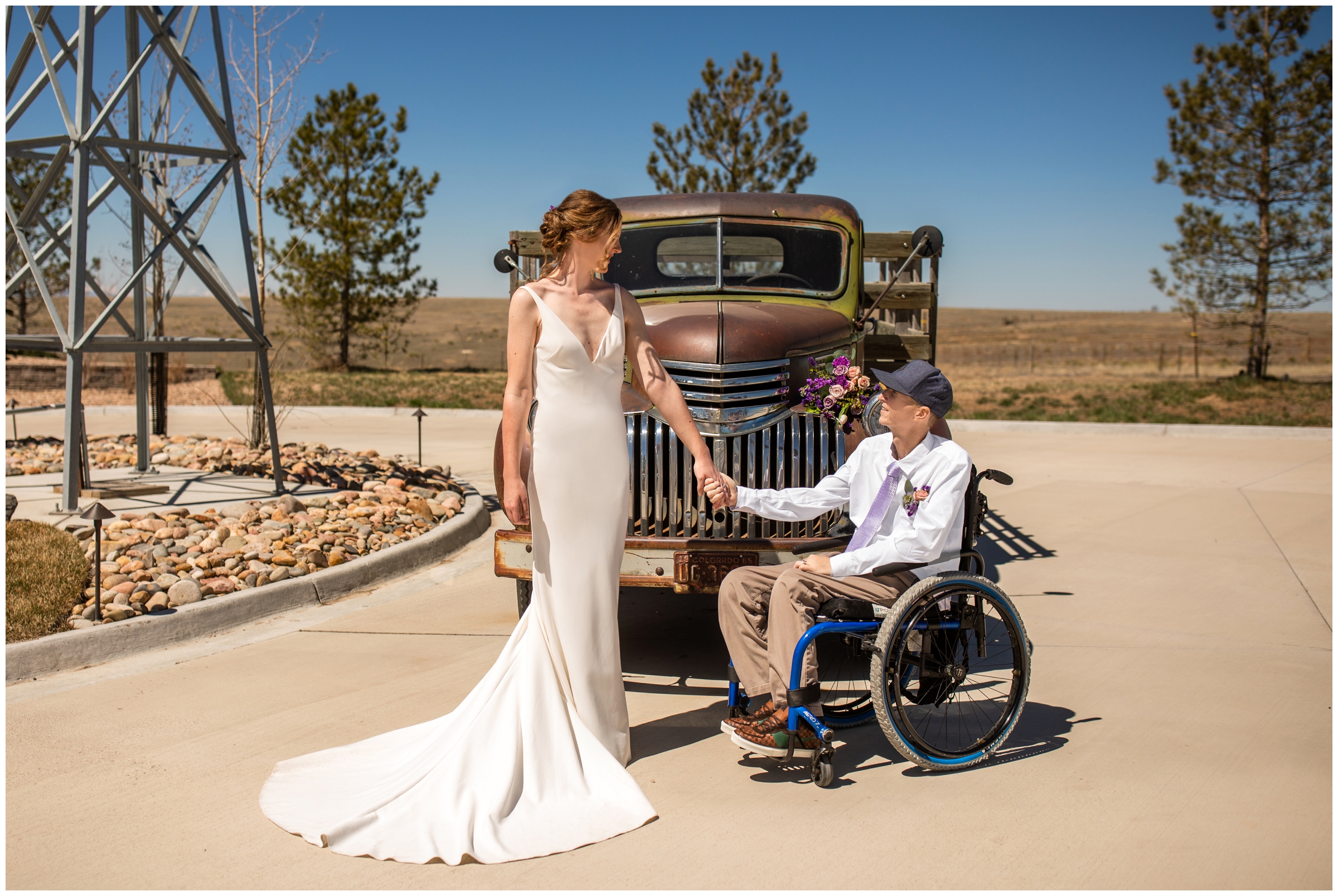 couple posing in front of rustic truck during spring micro wedding at Bonnie Blues