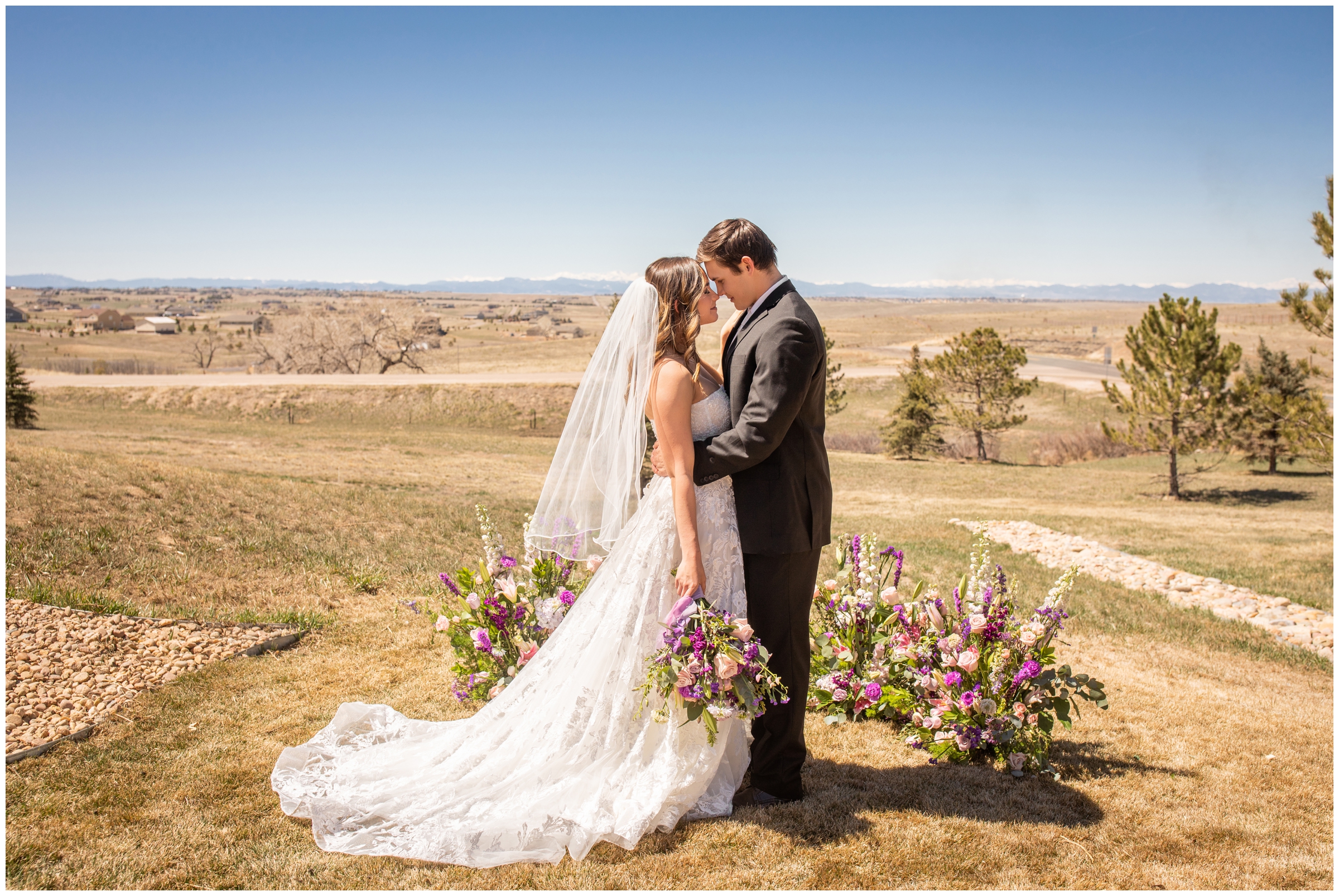 couple embracing during first look outside at Bonnie Blues Colorado elopement wedding during spring