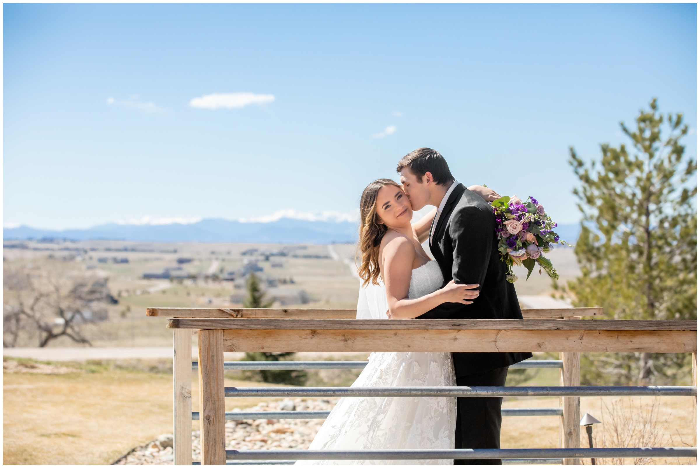 couple kissing on bride during spring micro wedding at Bonnie Blues in Colorado 