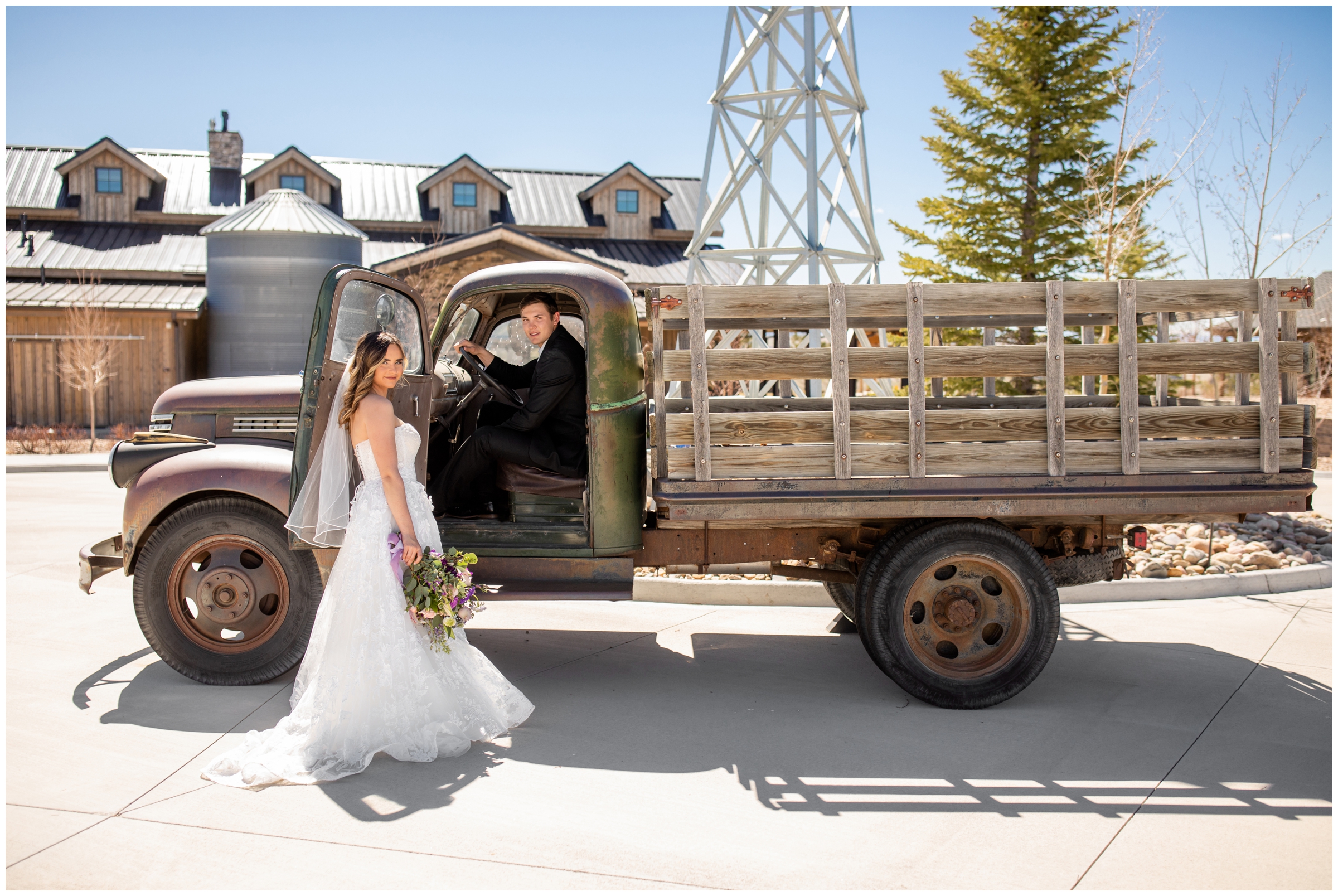 couple posing with vintage truck at Bonnie Blues Event Venue during elopement wedding in Colorado 