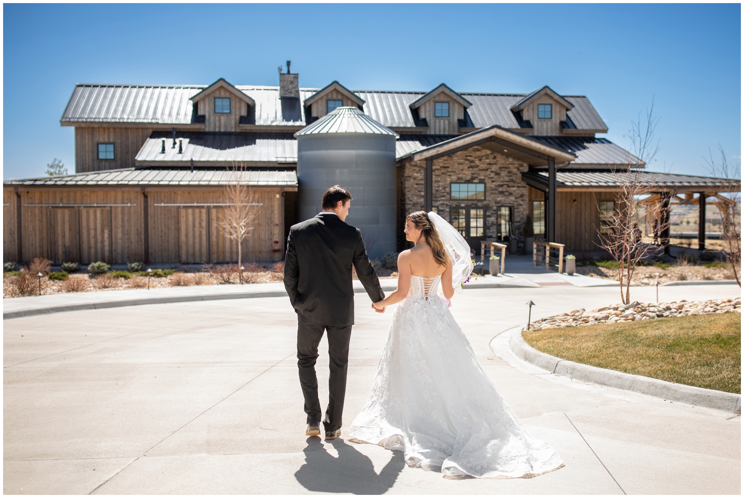 couple holding hands and walking toward Bonnie Blues wedding venue during spring micro wedding