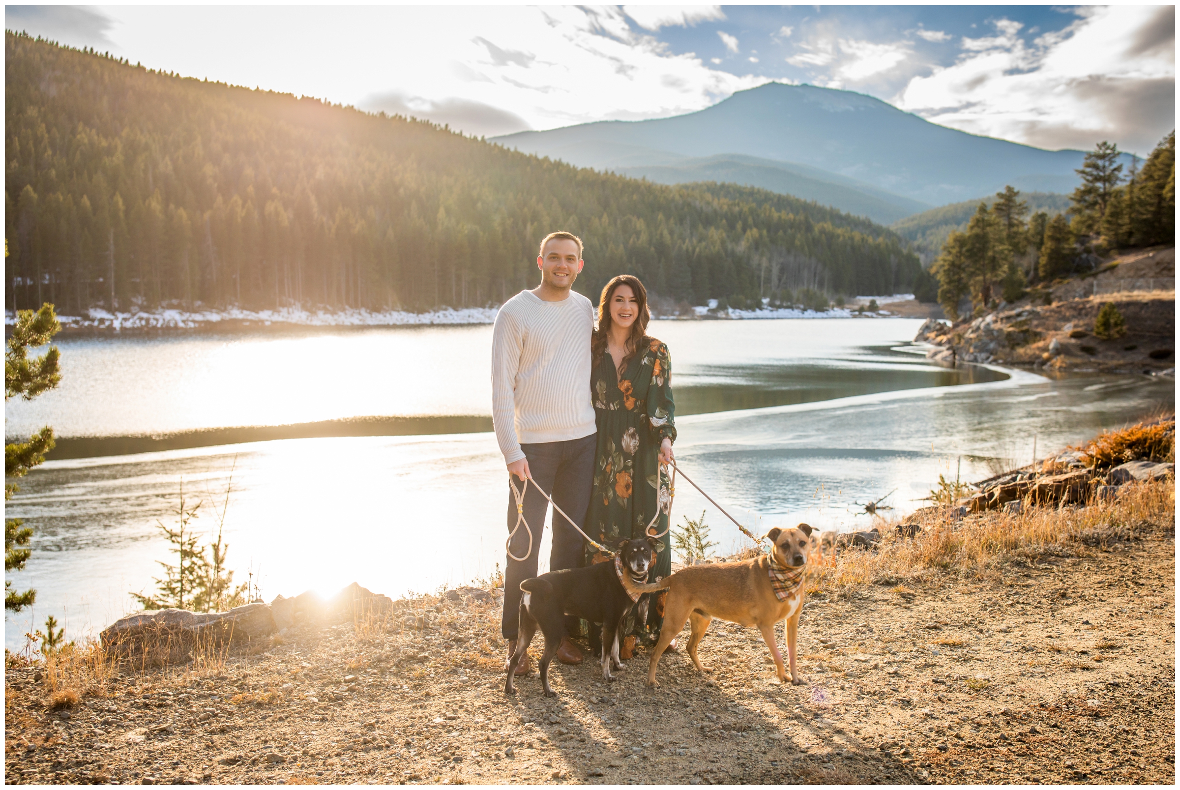 couple posing with their dogs during Colorado mountain couples photos in Evergreen 
